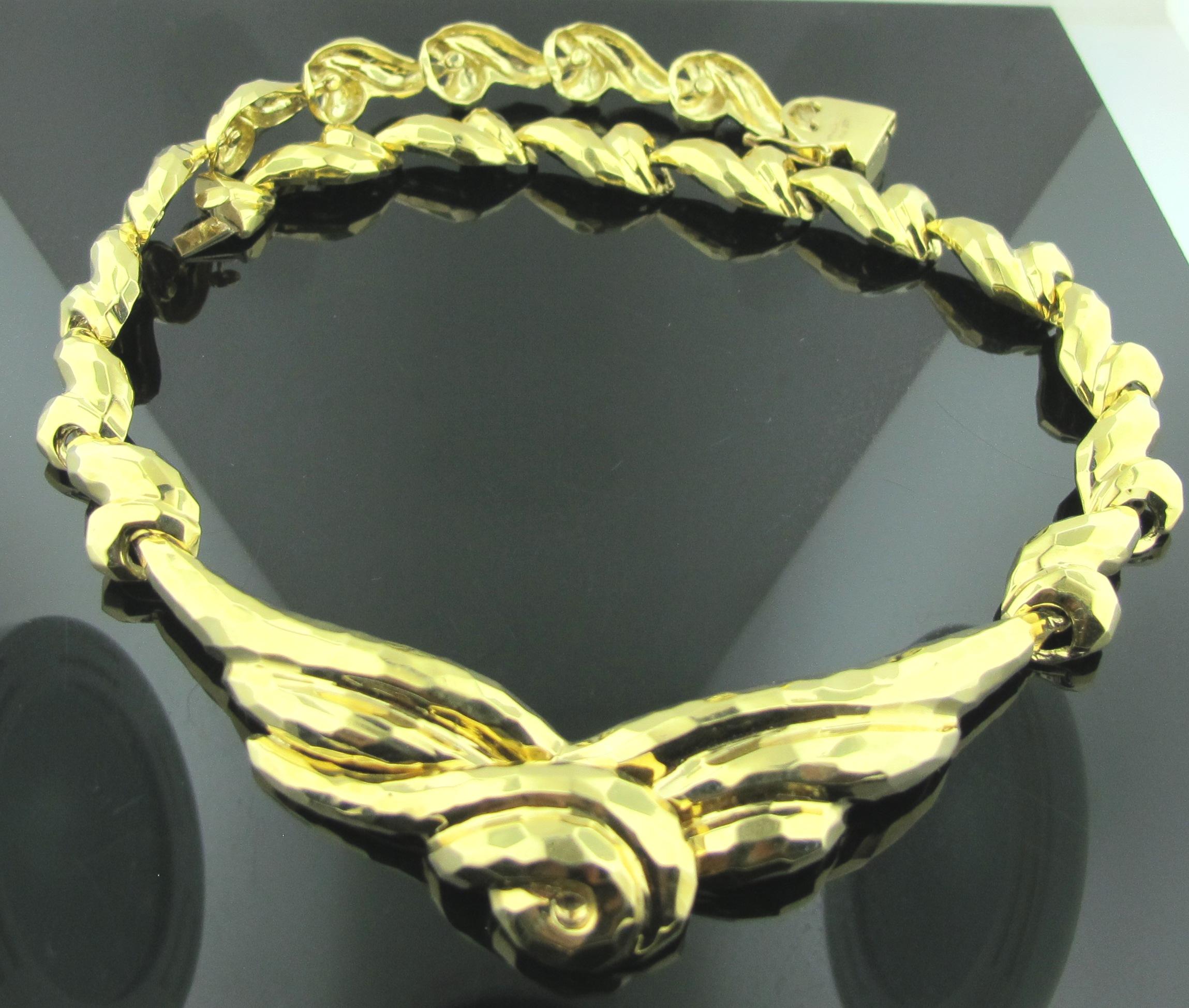 Hammered 18 karat yellow gold necklace.  77 grams.