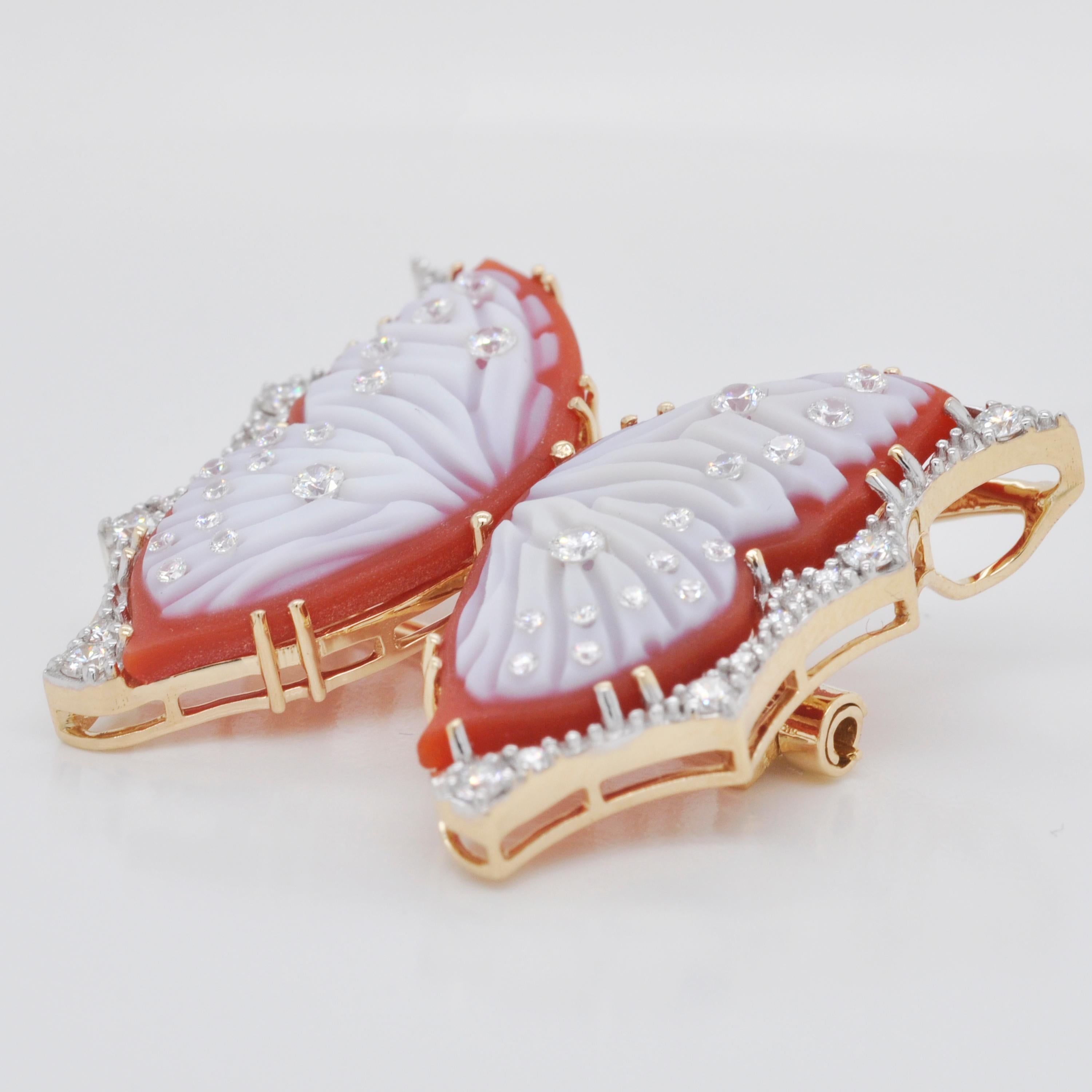 18 karat gold hand-carved agate red butterfly diamond pendant necklace brooch. 

The process of making this pendant / brooch set in 18k gold with sparkling diamonds, started just like that of a Butterfly. As the little caterpillar goes through the