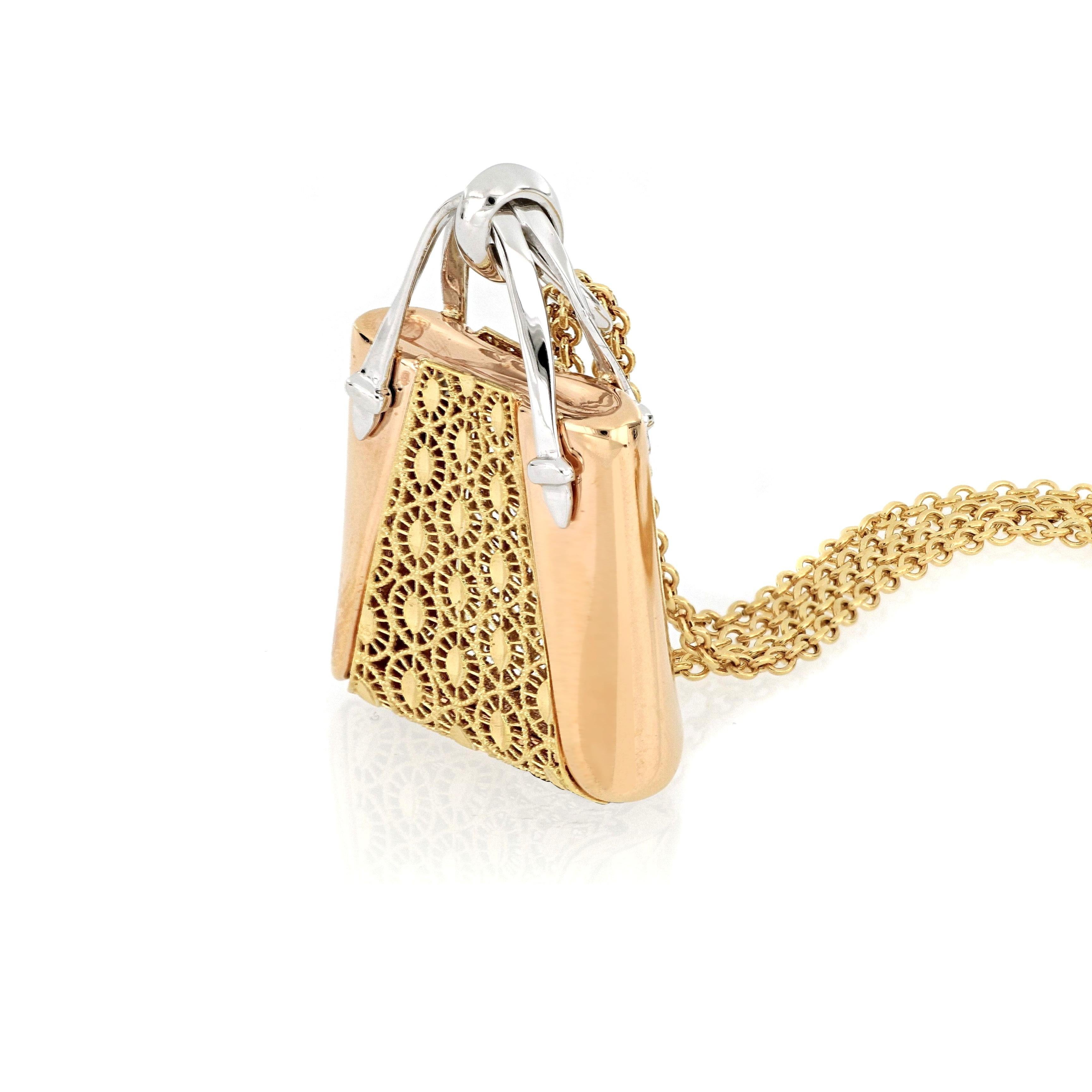 18 karat rose and yellow gold necklace with a handbag pendant, with fabulous design and very fine Italian craftsmanship, suitable for everyday wear. 
O’Che 1867 was founded one and a half centuries ago in Macau. The brand is renowned for its high