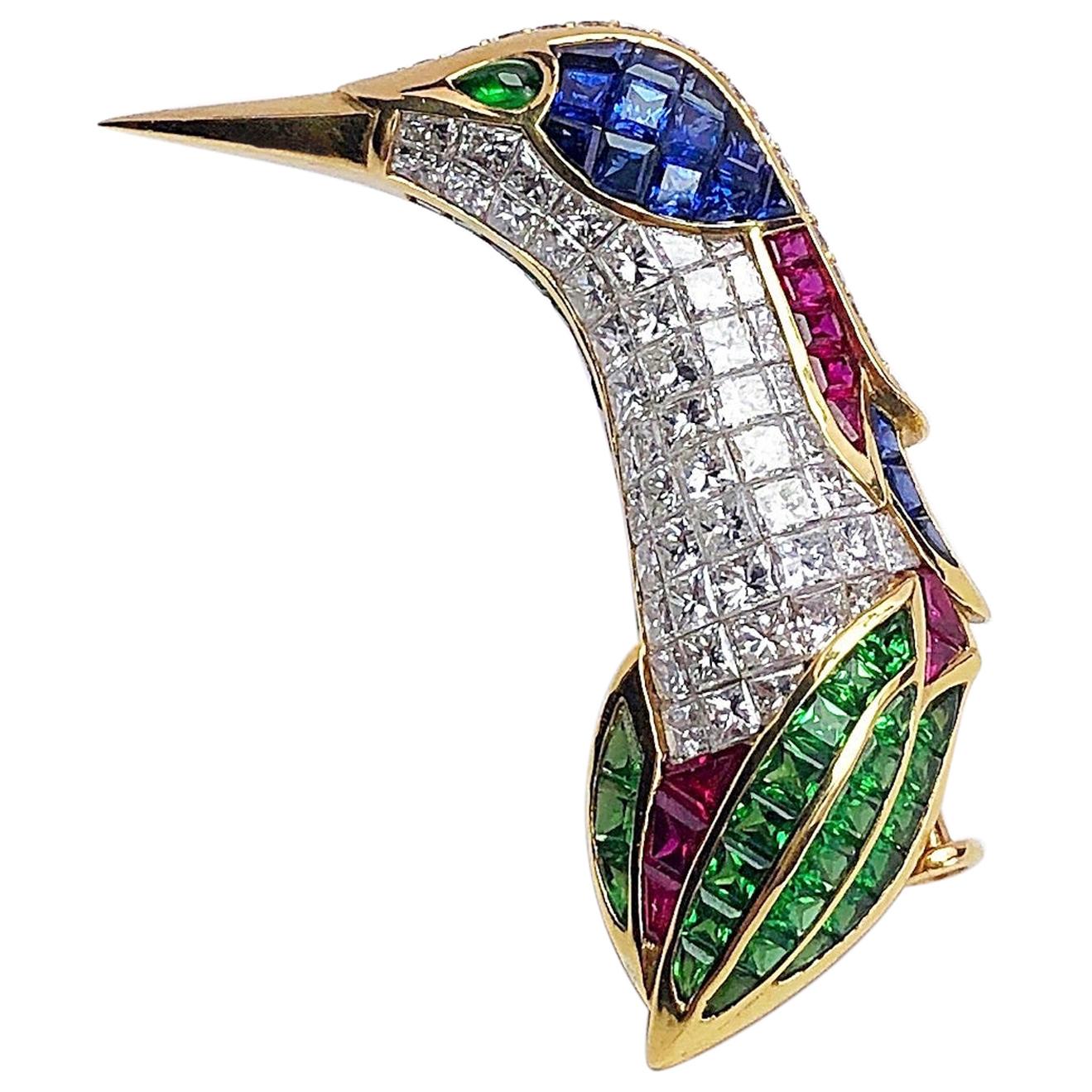 Broche oiseau en or 18 carats avec diamants et pierres précieuses sertis de manière invisible