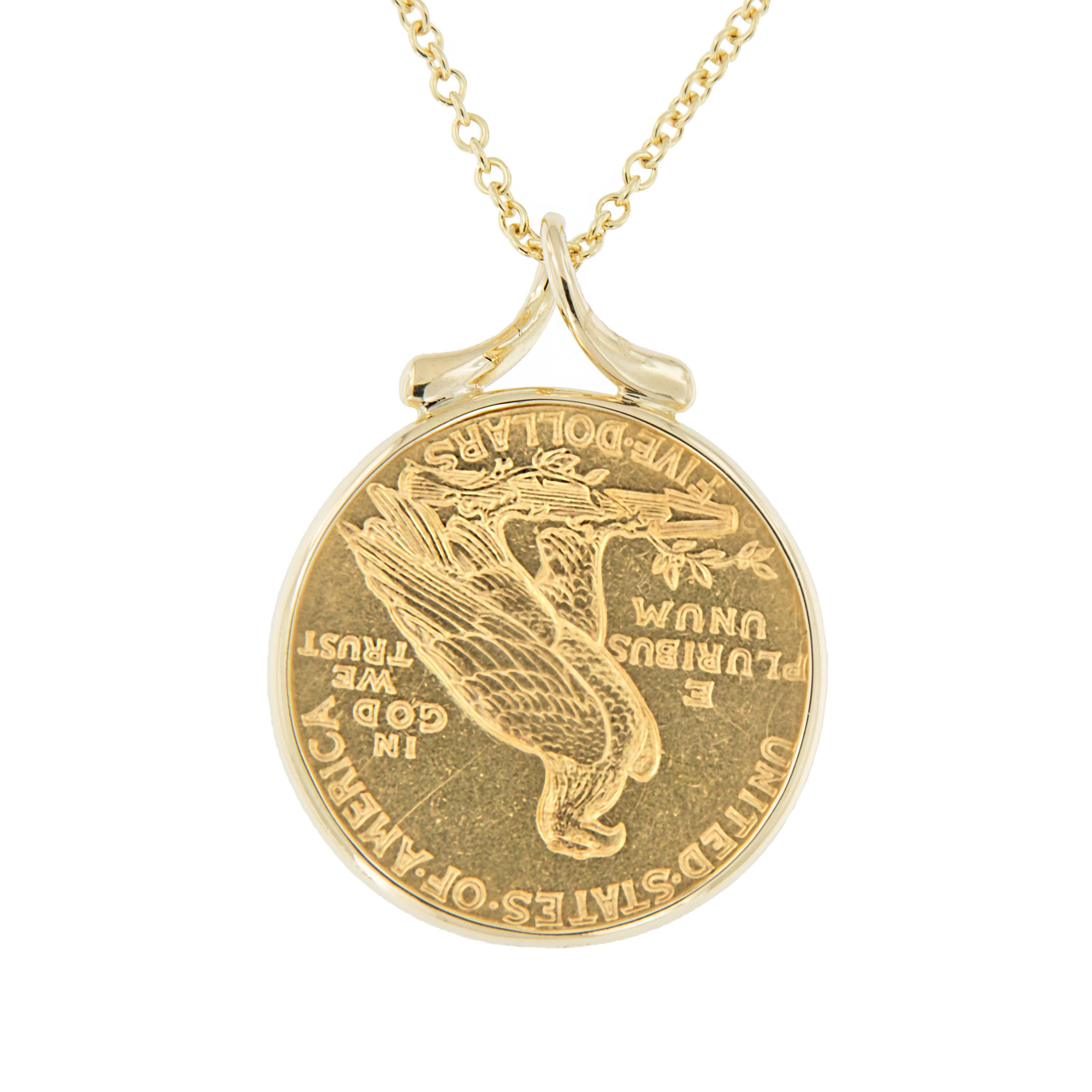 Enjoy a piece of American gold coin history! This 1925 $2.50 Indian head quarter eagle coin is framed in 18k yellow gold and suspends from a ribbon-style bail on a 16-inch chain. Pendant measures 27.5mm tall x 19mm wide. Signature wrapping and