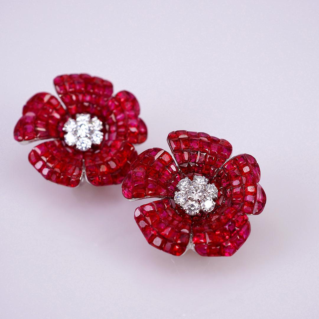 The top quality Ruby which make in invisible setting. We set the stone in perfection as we are professional in this kind of setting more than 40 years. The invisible is a highly technique .We cut and groove every stone .Therefore; we can guarantee