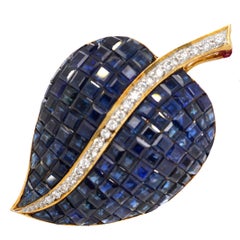 18 Karat Gold Invisibly Set Sapphire and Diamond Brooch