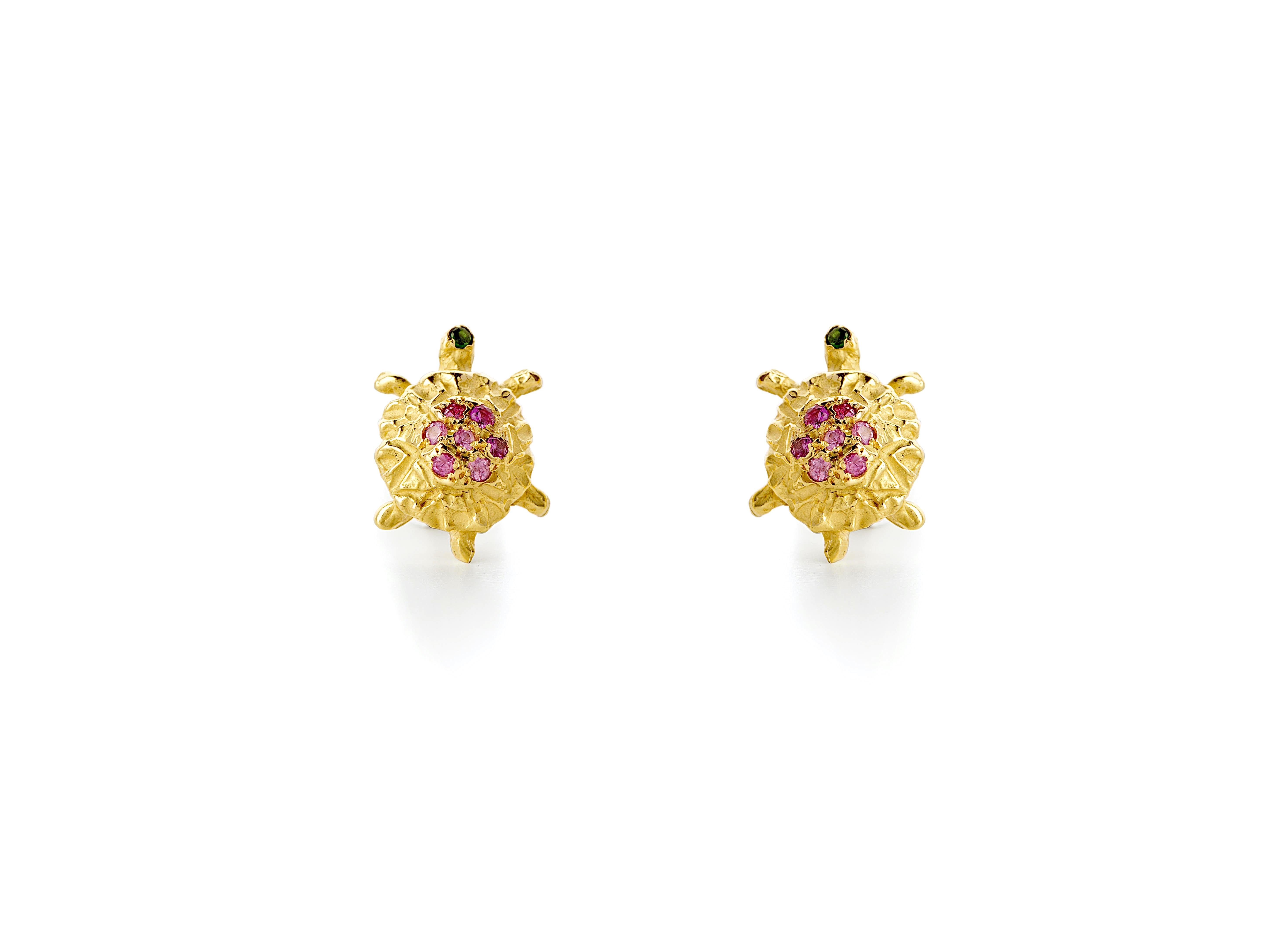 Rossella Ugolini Design Collection, a pair of Little Turtles Stud Earrings handcrafted in 18 Karats Yellow Gold and adorned with a beautiful pink tourmaline and green tsavorite head. 
Giving a turtle as a gift means wishing a long and peaceful life.