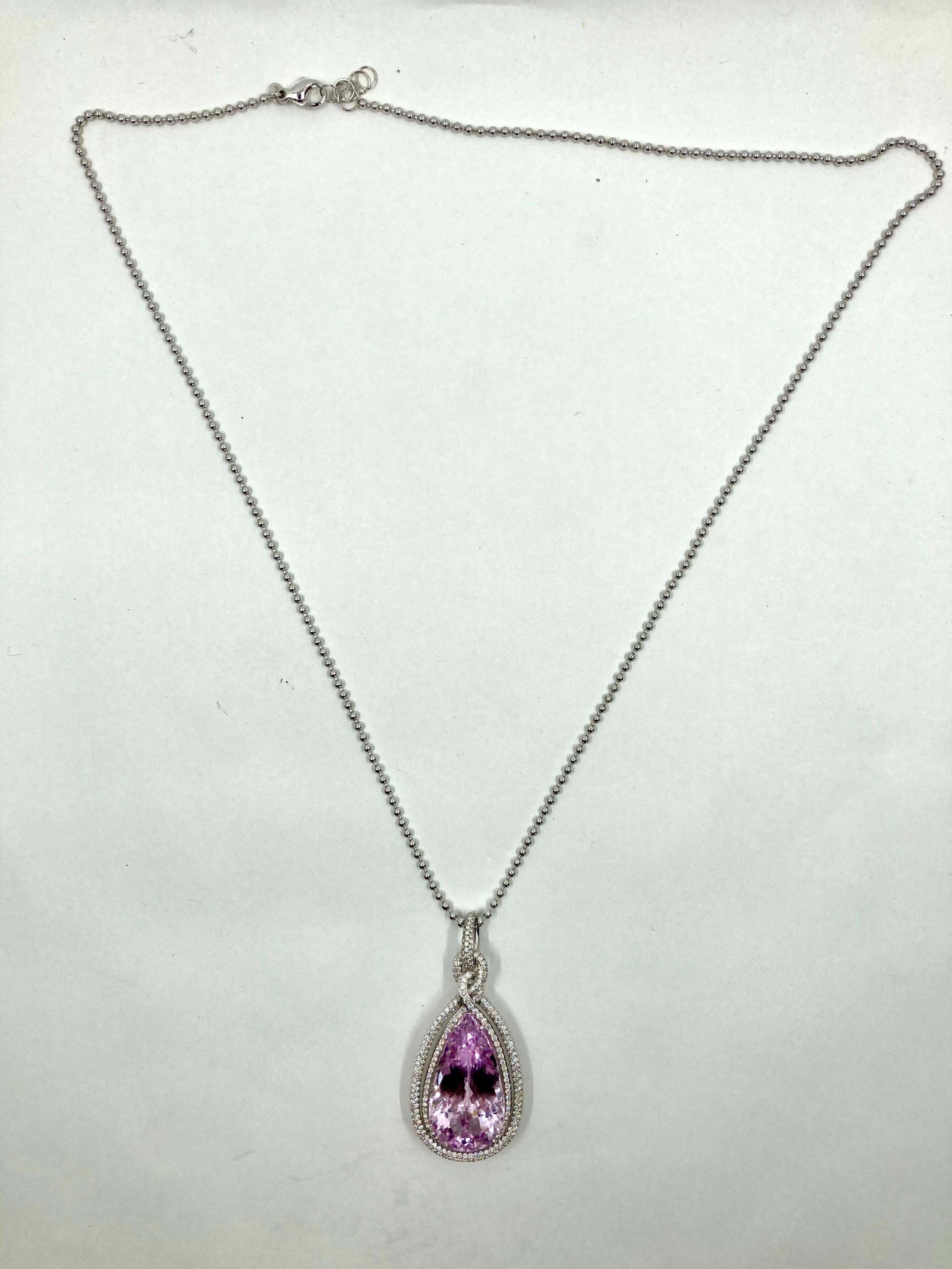 Timeless White Gold Necklace, with Kunzite ct. 46,50 and Diamonds ct. 1.93, Made in Italy by Roberto Casarin

a pear-shaped Kunzite is the main protagonist of this timeless pendant necklace. With its 46,50 Carat, settled in a white gold frame with