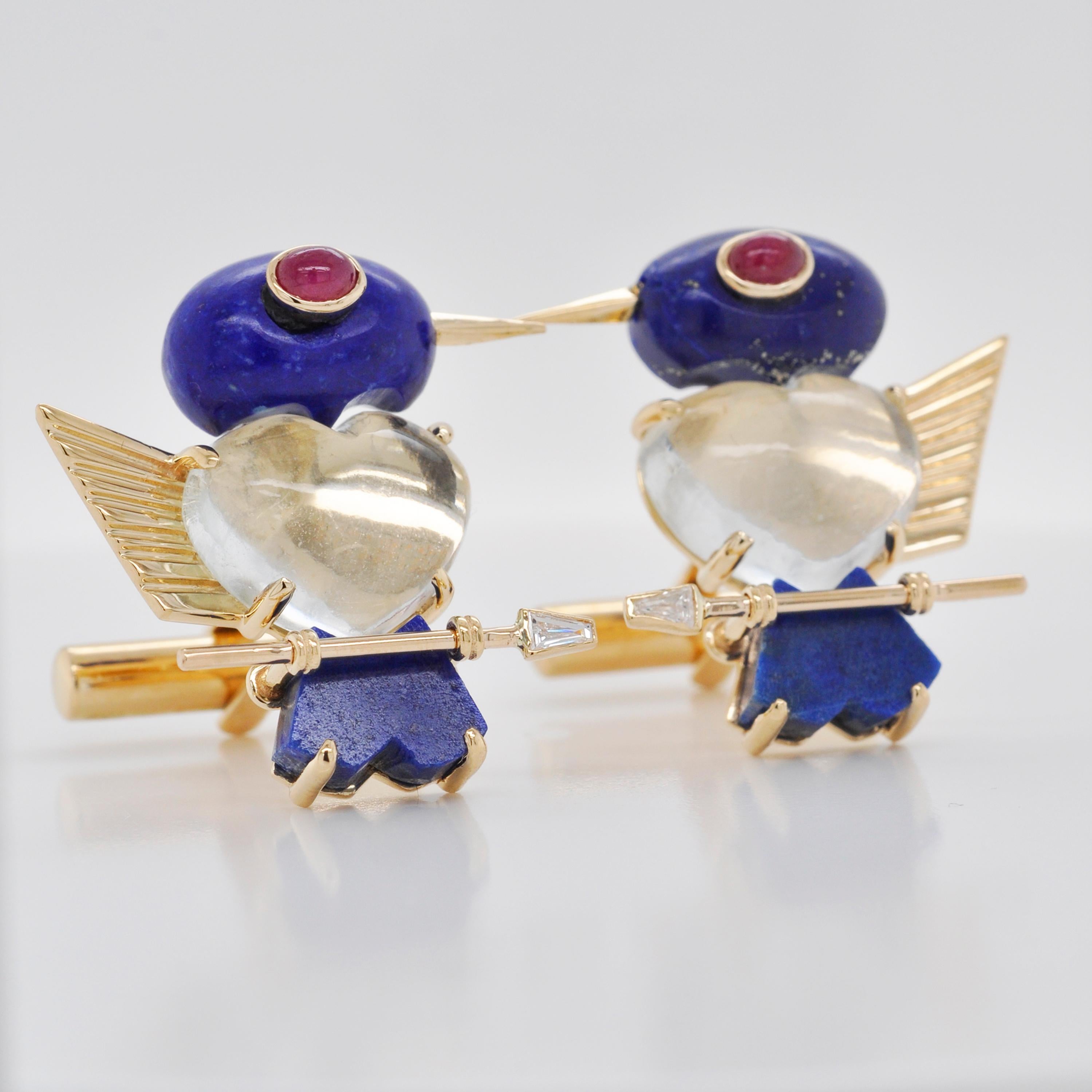 18 karat gold lapis lazuli moonstone ruby diamond baguette bird cufflinks

These one of a kind 18 karat gold Bird cufflinks are extremely unique. In the head part of the bird, Lapis Lazuli cabochons are drilled to set the ruby cabochon in gold for