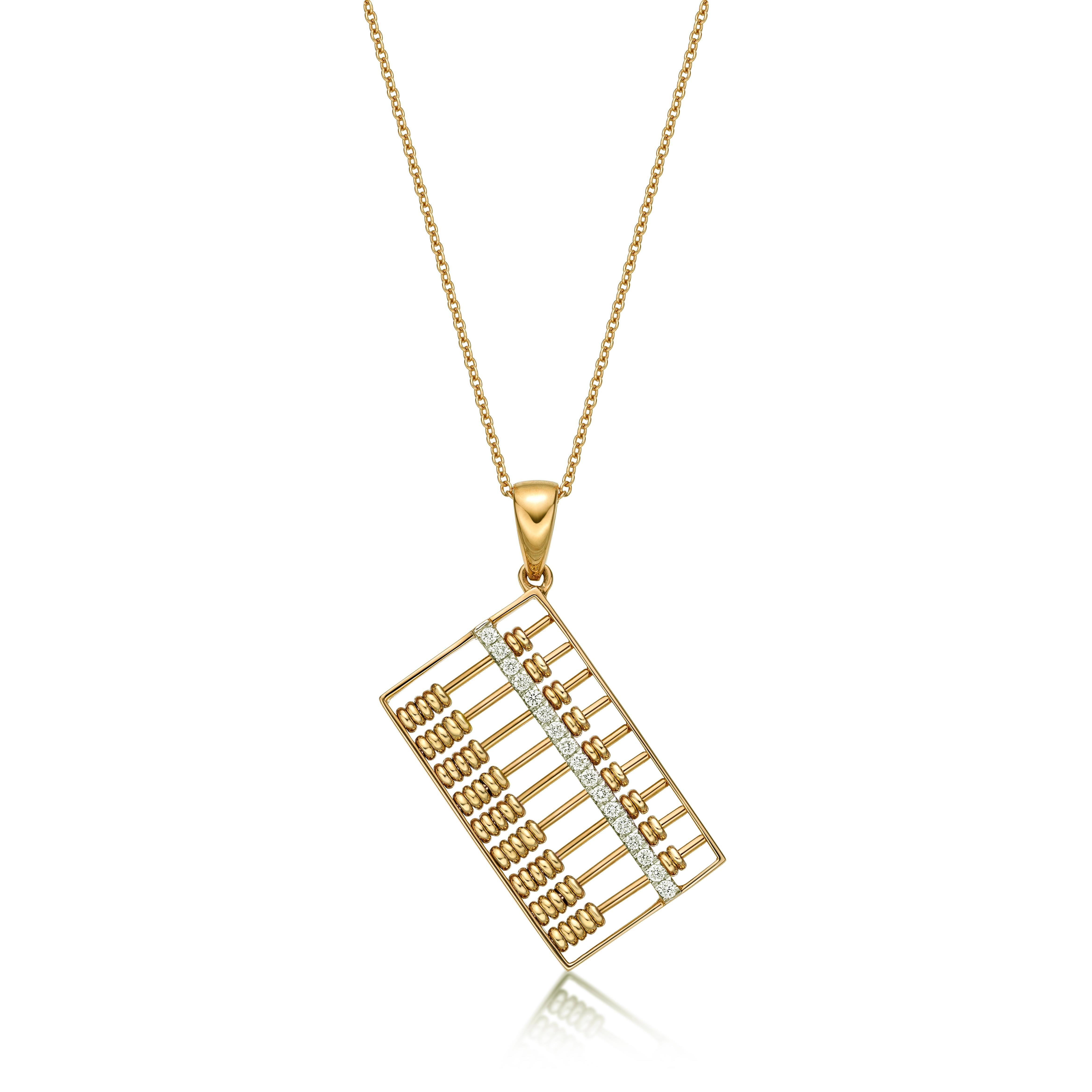 Abacus pendant with moving beads, set with diamonds weighing 0.29 carats, mounted in 18 karat gold, available in different colours (yellow gold, white gold and rose gold)
Abacus, invented in ancient China  more than 2,600 years ago, is a traditional