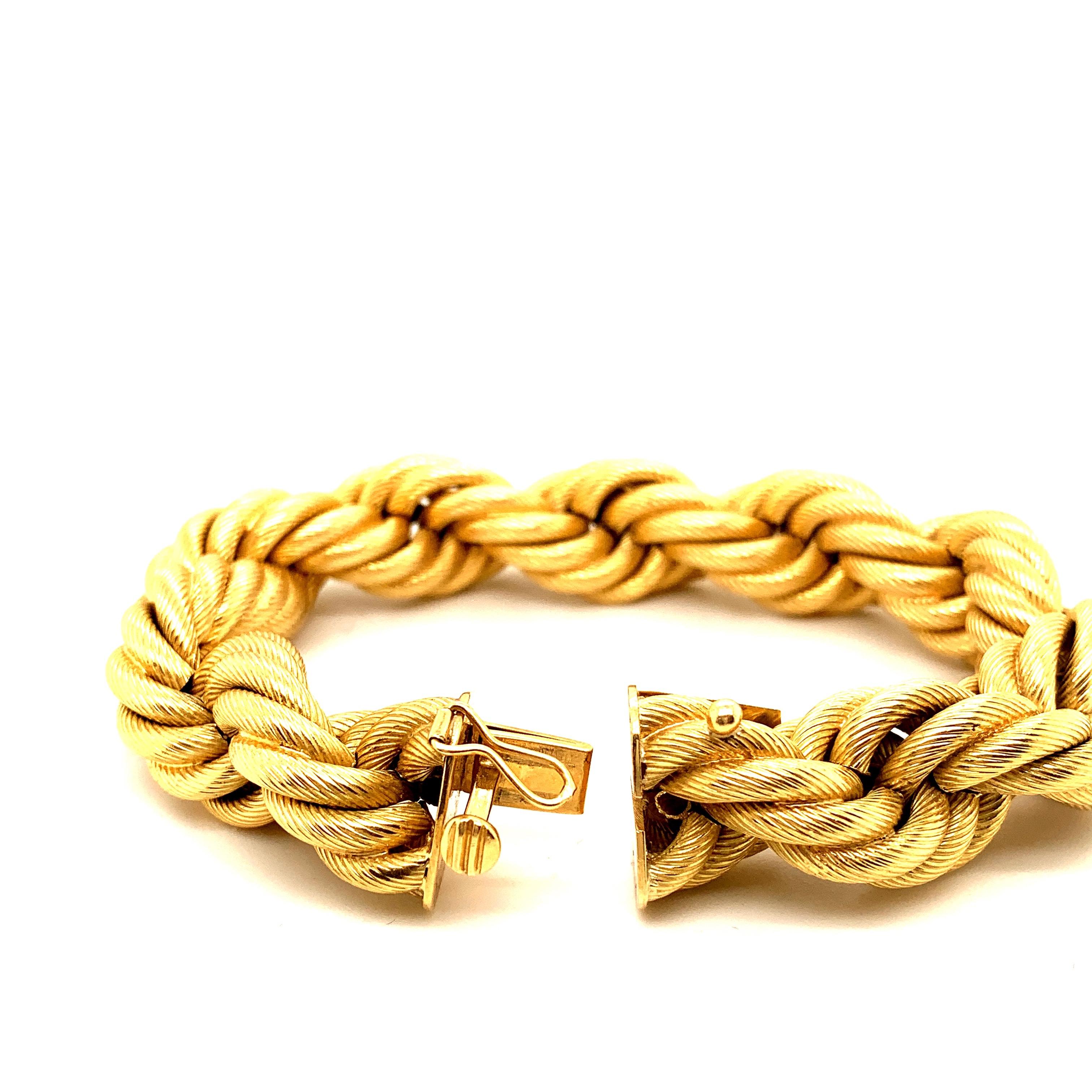 Beautiful Italian twisted ”Rope” Gold bracelet.
This bold bracelet Weighing over 66 grams of 18k Gold is an attractive statement piece. 
Measuring 8 inches in length.
What’s old is new again.