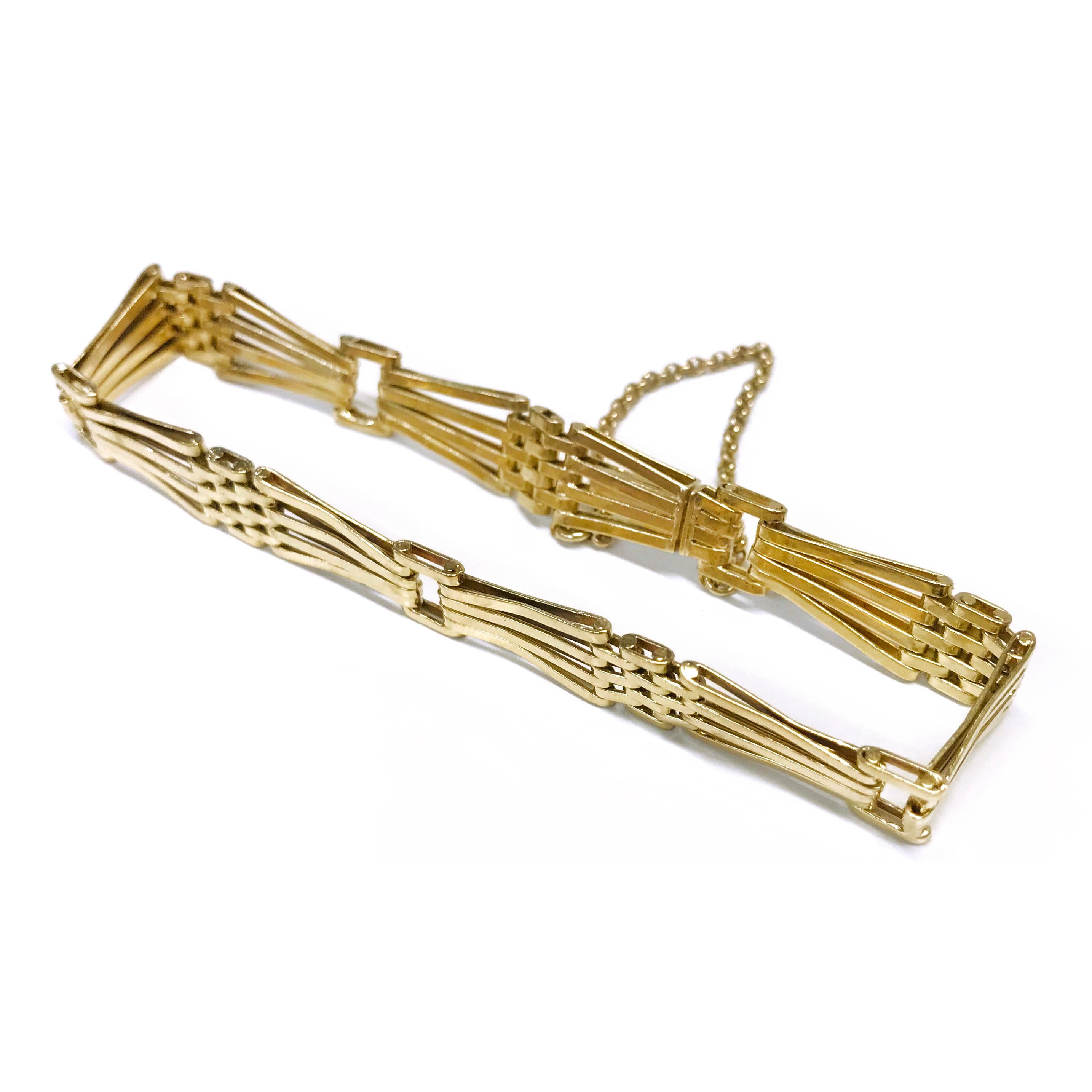 18 Karat Gold Link Bracelet. The handmade bracelet features yellow gold tapered double links, open square links, and smaller rectangular links. The bracelet width ranges from 8.5mm to 7.3mm and it's 7 1/4