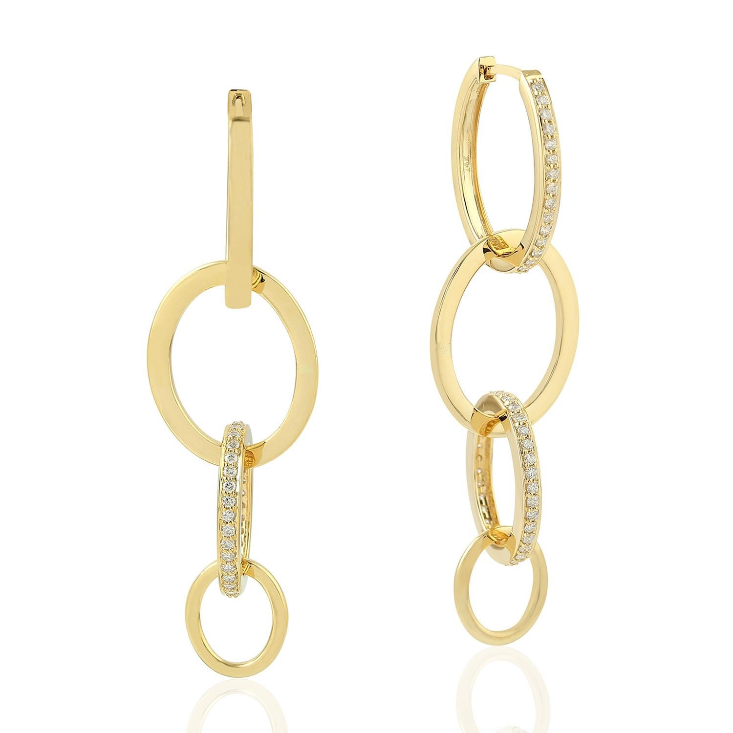 Modern Interlocking 18 Karat Gold Diamond Earrings For Sale
