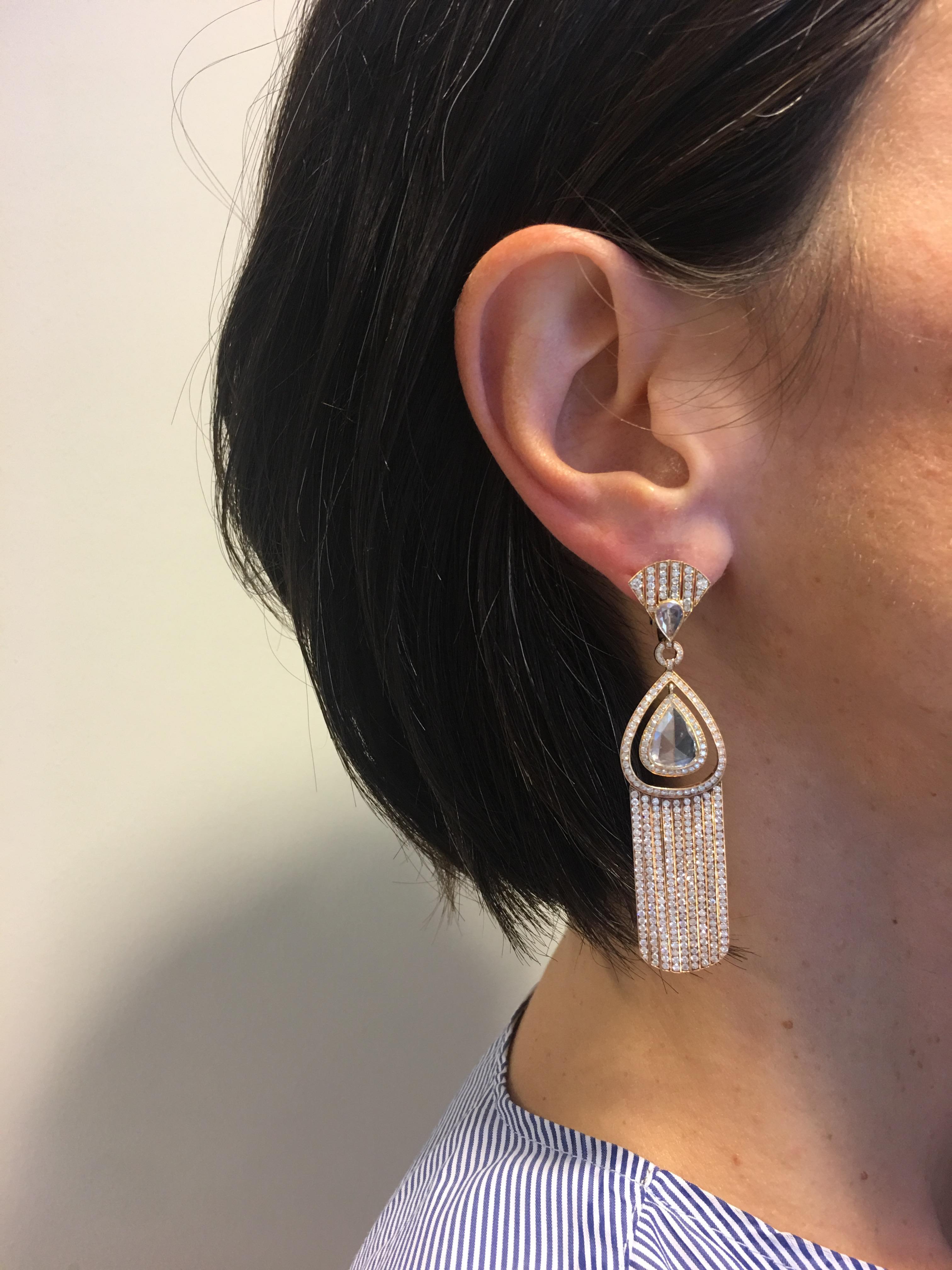 18 Karat Rose gold one of a kind earrings set with central pear-shaped rose cut diamonds: one is 1.30 carats and the other is 0.98 carats, further two pear-shaped rose cut diamonds of 0.85 carats and 662 brilliant cut diamonds with the total weight