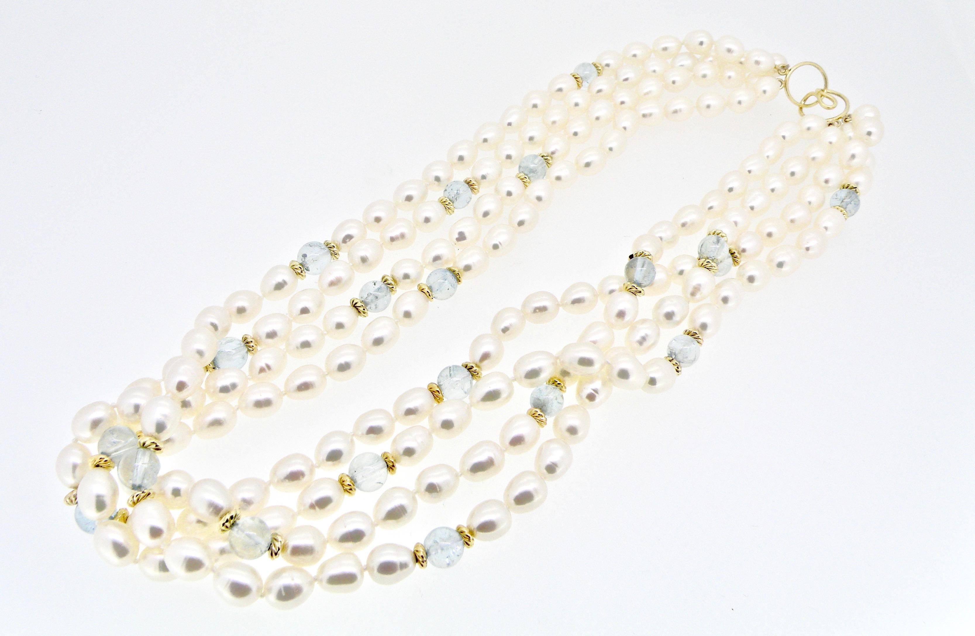 16” twisted multi strand pearl,gold and aquamarine necklace