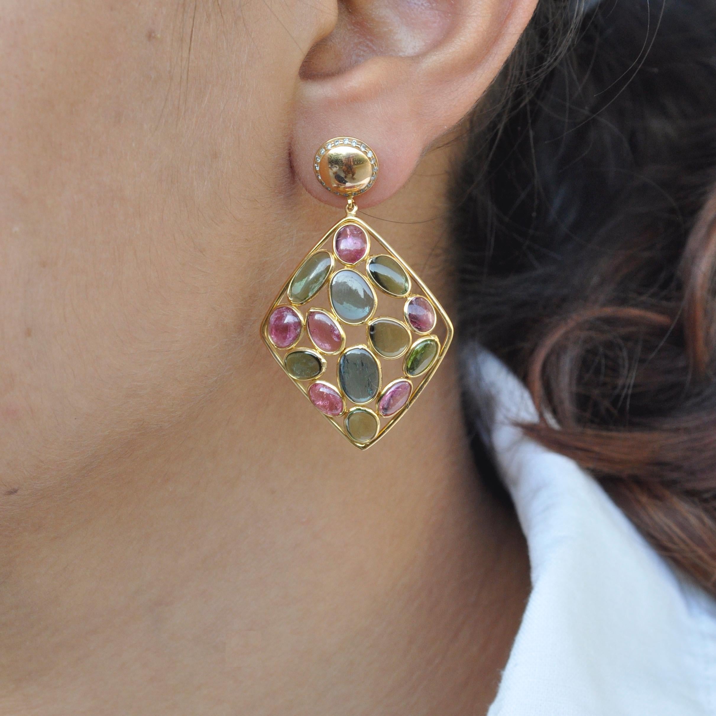 Celebrate colors.... Don't keep these earrings in your locker box - these are meant to be worn!!! These colorful earrings are 18ky with multi-color tourmaline gemstones. The gemstones include Pink Tourmaline, Green Tourmaline and Blue Tourmaline.