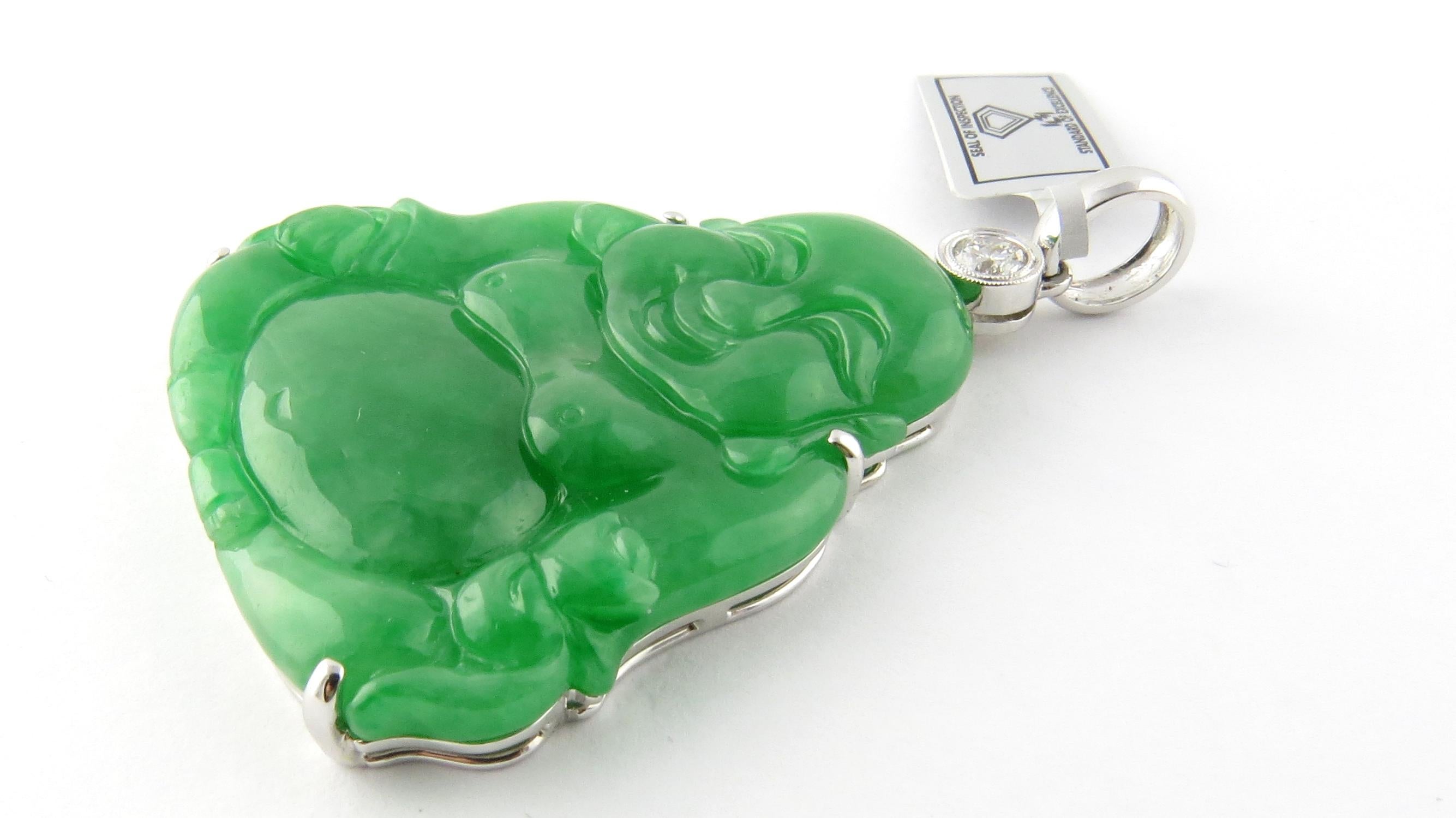  18K White Gold Natural Jade and Diamond Large Buddha Pendant

This happy Buddha pendant is set in an 18K white gold mounting.

One natural Jade is approx. 75.94 cts.

One round brilliant diamond approx. .32 carats and SI1 - SI2, G-H

Stamped 18K