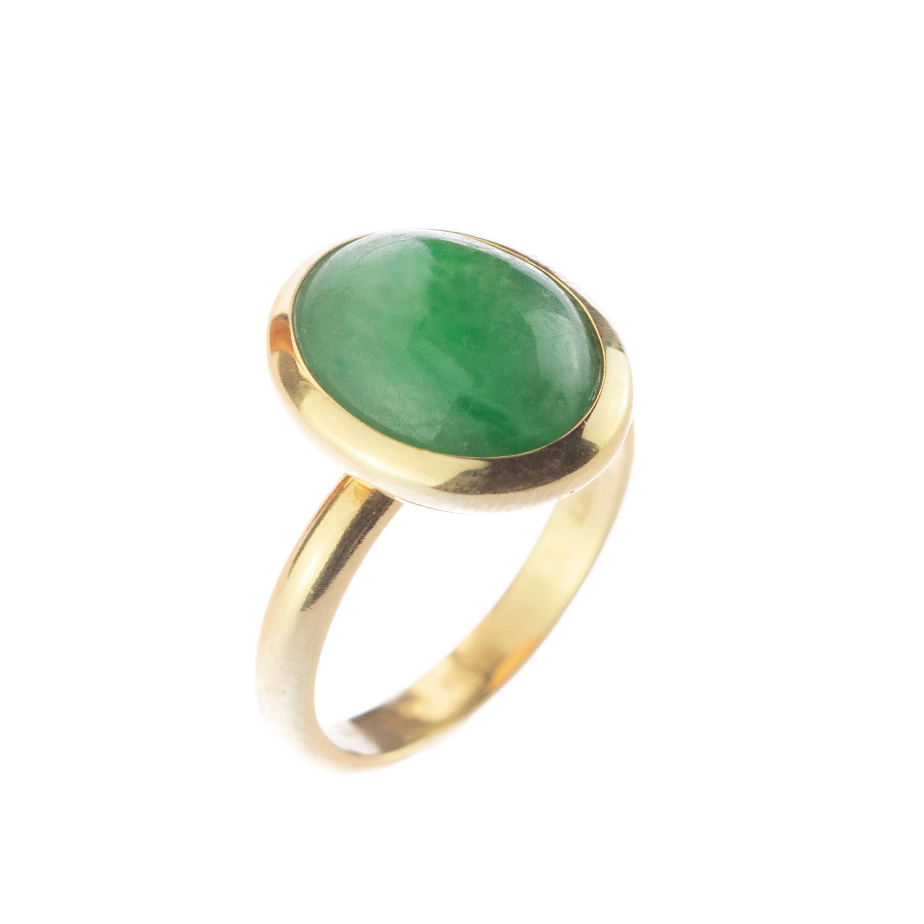 Women's 18 Karat Gold Natural Jade Green Central Oval Cabochon Boho Woman Cocktail Ring For Sale