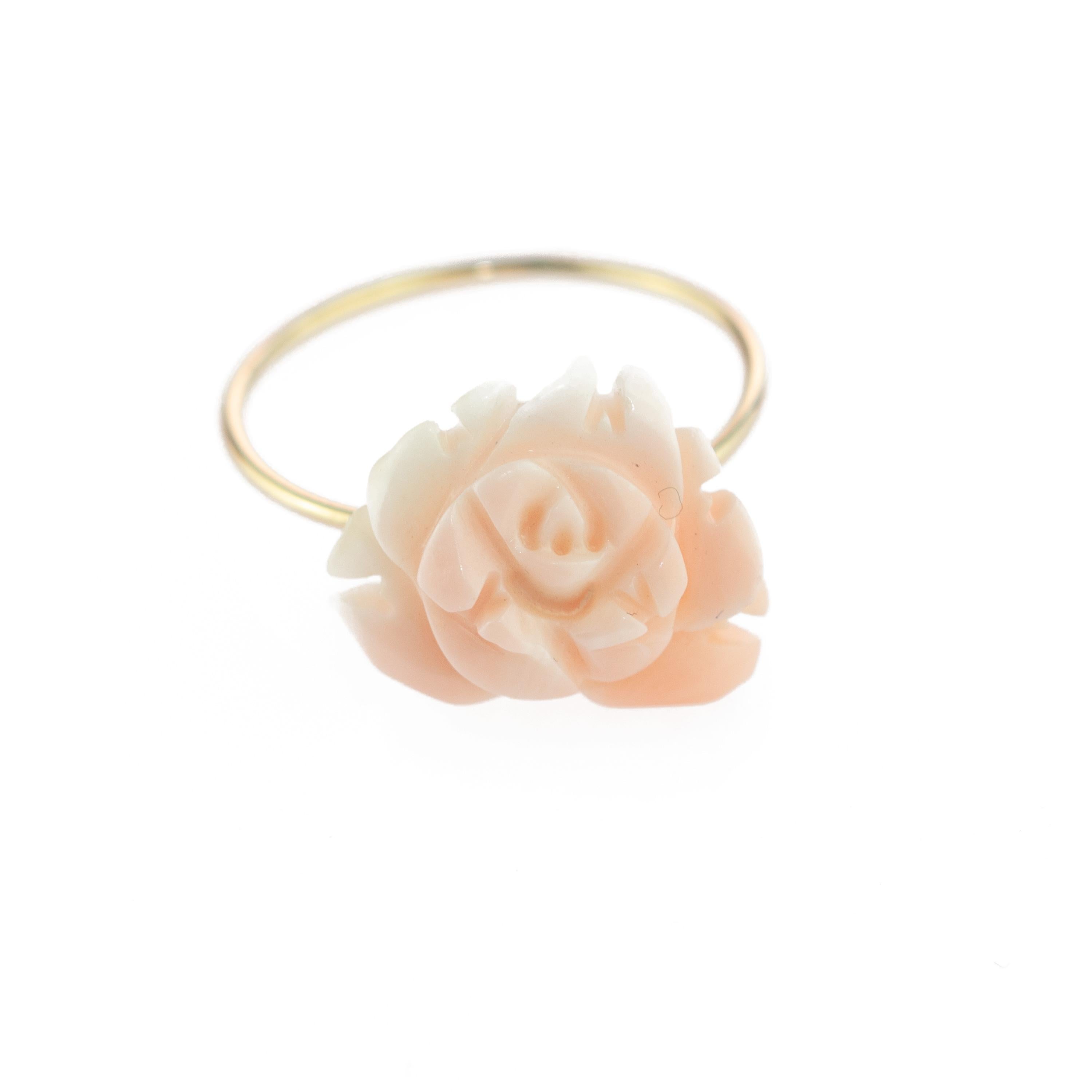 Astonishing and sweet 18 karat yellow gold and coral pink rose ring. Natural coral carved petals that evoke the italian handmade traditional crafted jewelry work. Unique rose carvings in top quality coral for a signature INTINI Jewels look. Elegant