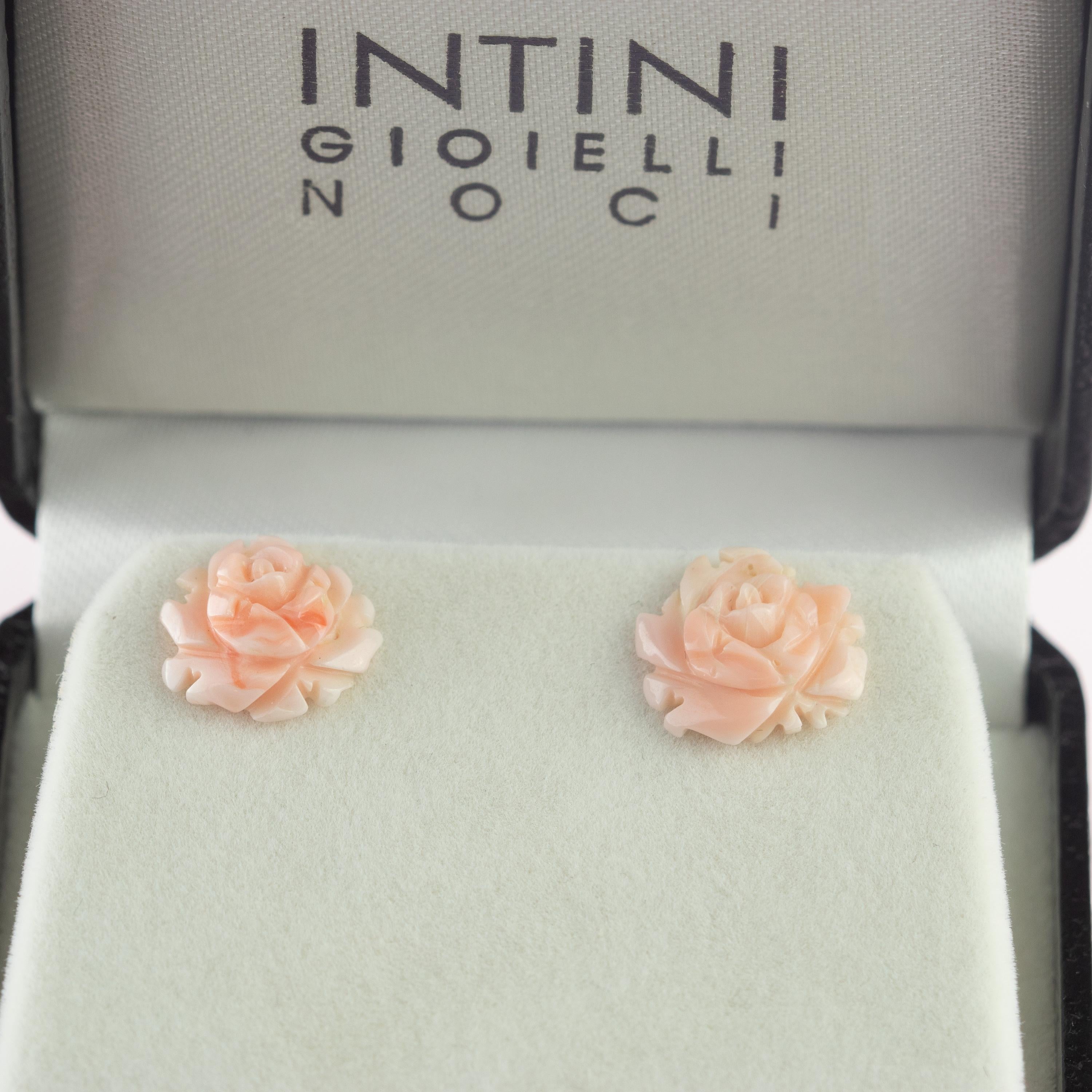 Astonishing and sweet pink rose earrings. Natural coral carved petals that evoke the italian handmade traditional crafted jewelry work. Unique rose carvings in top quality coral for a signature INTINI Jewels look. Elegant and contemporary stud