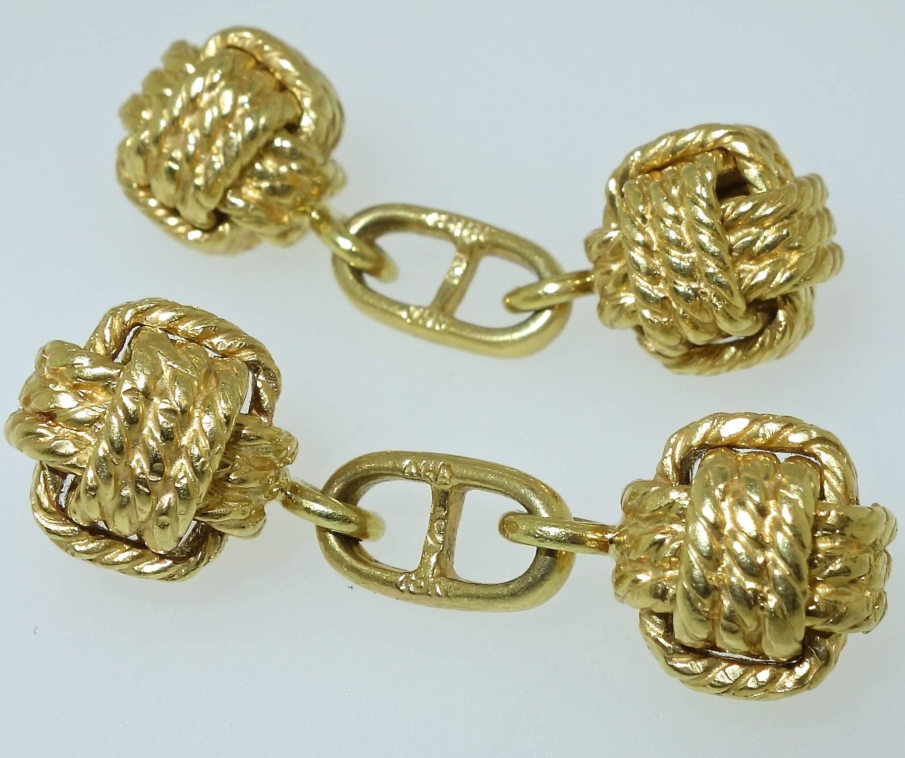 Heavy 18K yellow gold, 16 dwt, back to back cufflinks, 10.5 mm in diameter, circa 1960's, these cufflinks are of an unusual nautical theme. A boating/sailing enthusiast has told us that the knots are called “monkeys fists”, and were tied around a