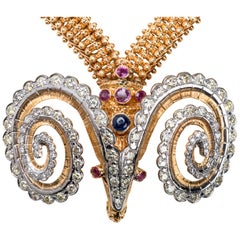 18 Karat Gold Necklace with Pendant with Diamonds Rubies and a Cabochon Sapphire