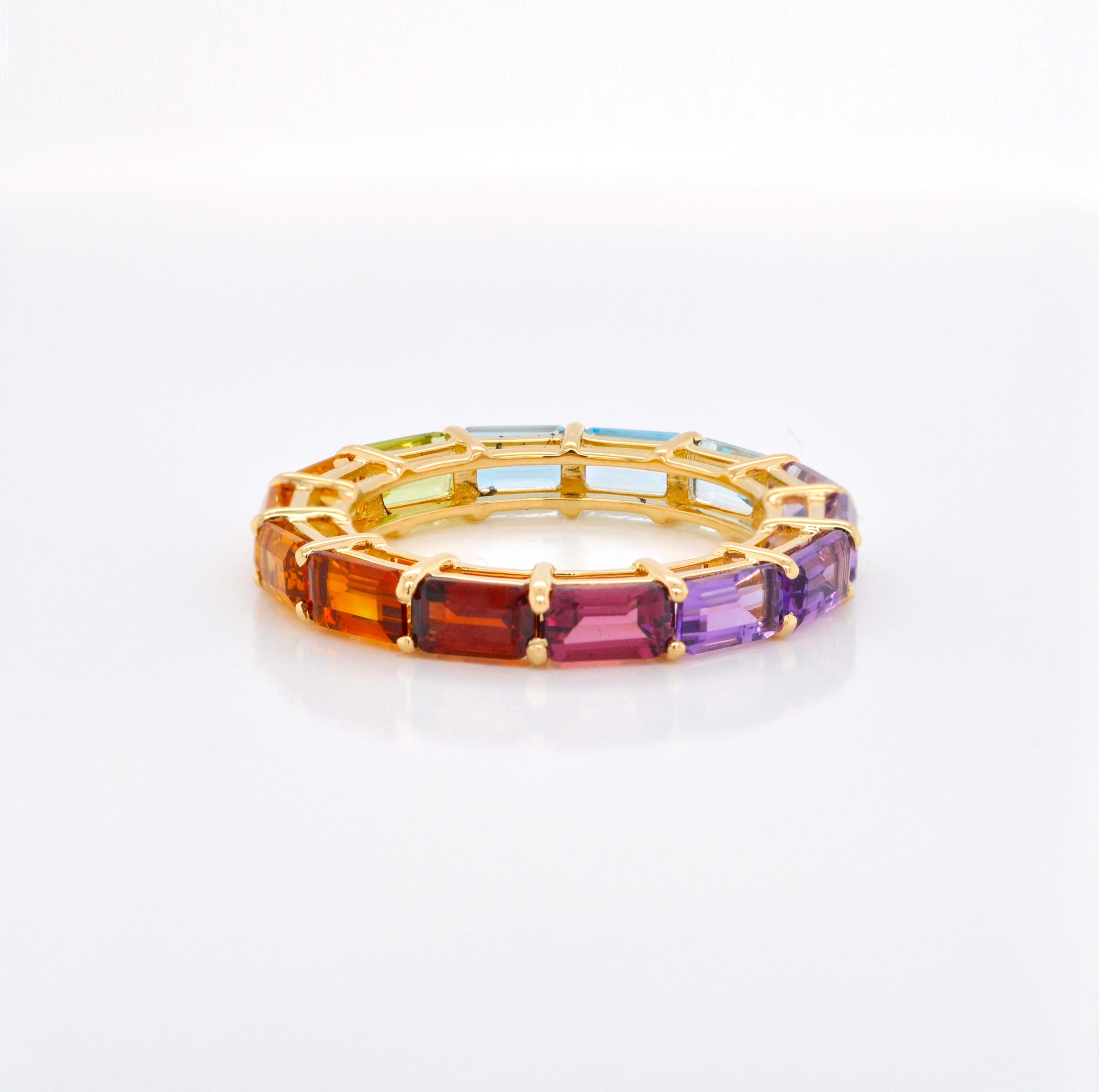 For Sale:  18 Karat Gold Octagon Multicolor Rainbow Gemstones Prong Set Eternity Band Ring 10