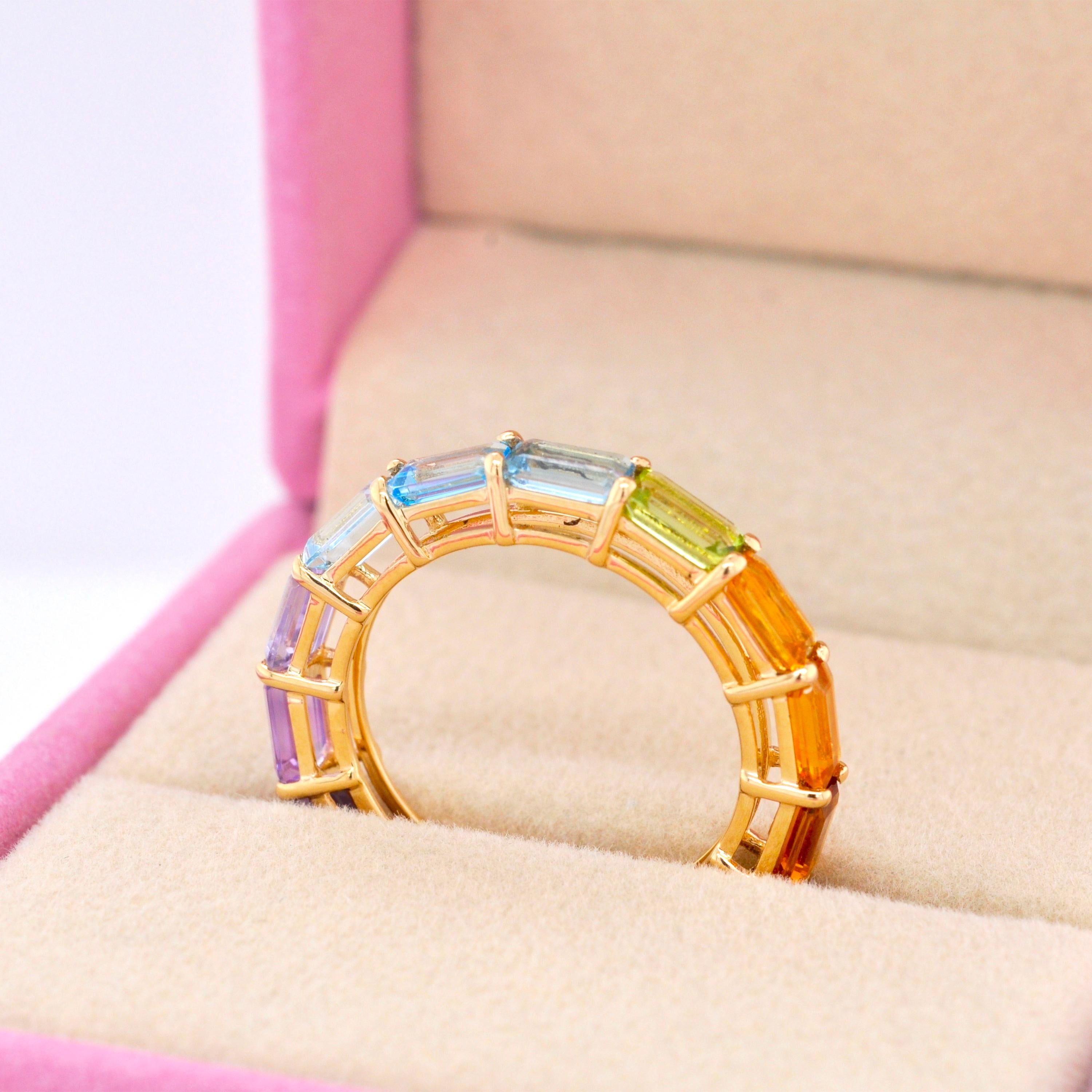 For Sale:  18 Karat Gold Octagon Multicolor Rainbow Gemstones Prong Set Eternity Band Ring 7