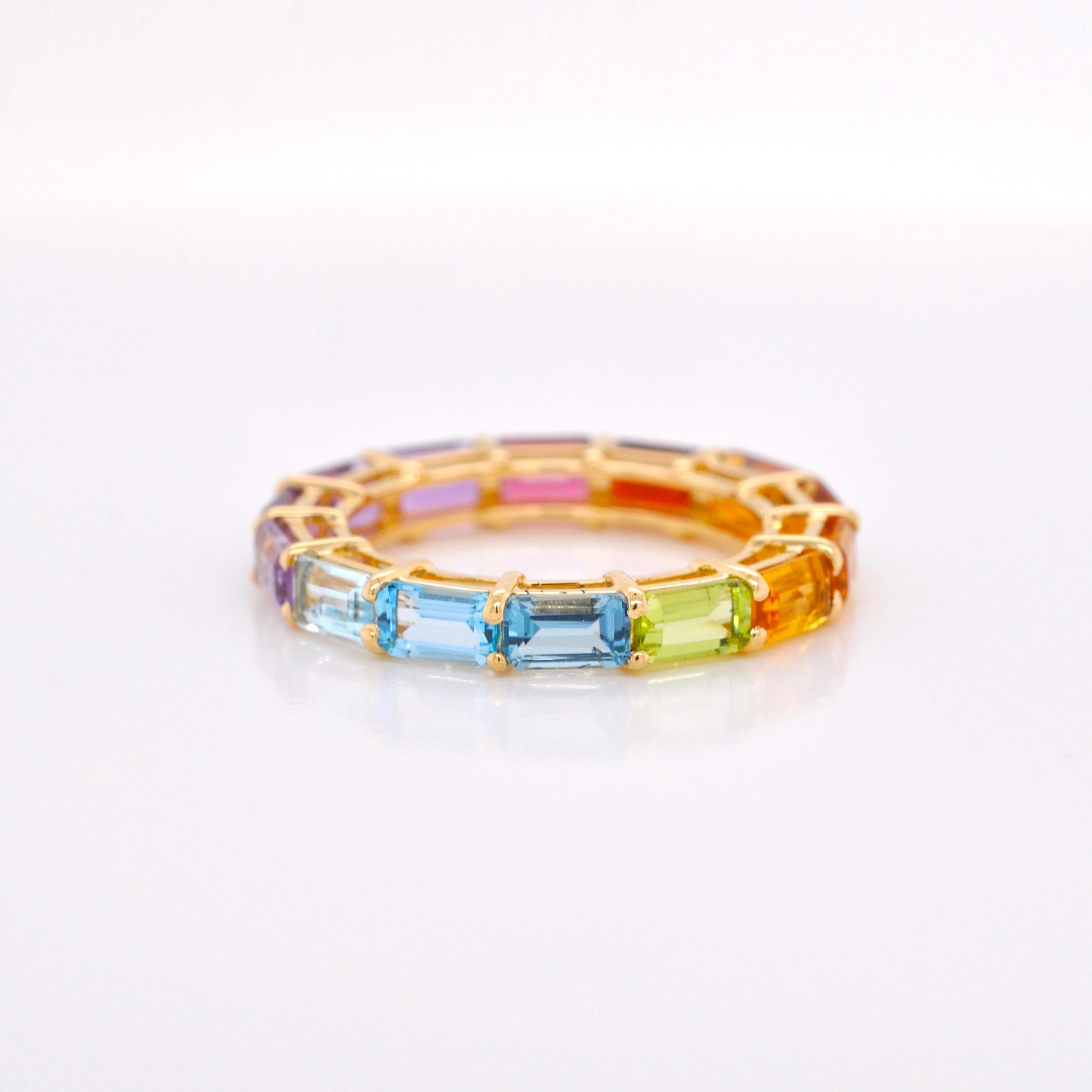 For Sale:  18 Karat Gold Octagon Multicolor Rainbow Gemstones Prong Set Eternity Band Ring 8