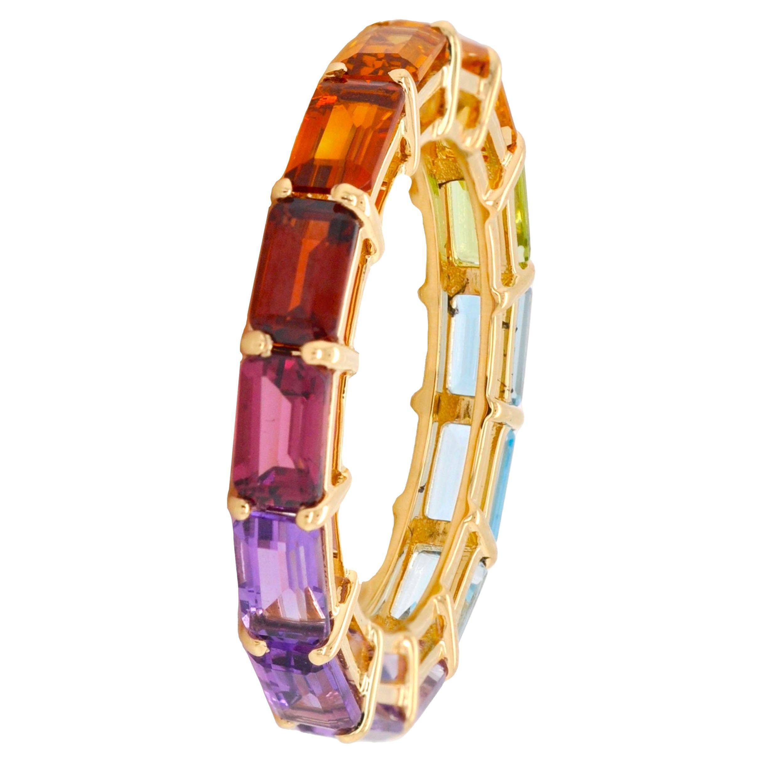 For Sale:  18 Karat Gold Octagon Multicolor Rainbow Gemstones Prong Set Eternity Band Ring