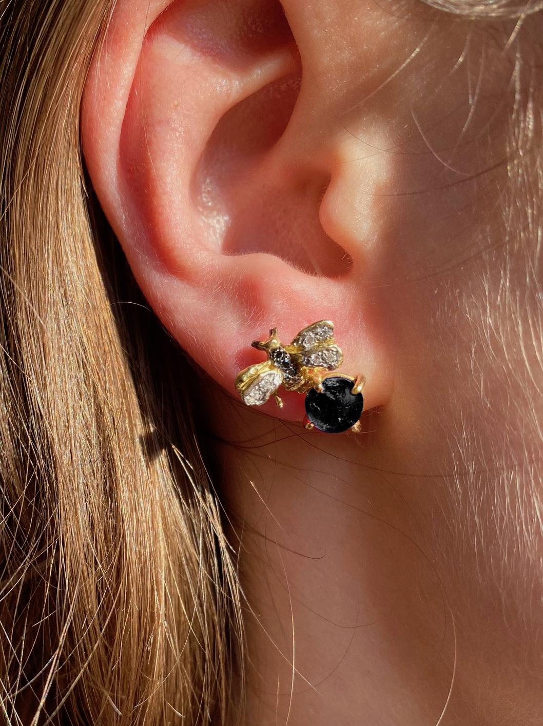 Rossella Ugolini Design Collection, 18 Karat Yellow Gold Black Onyx 0.10 Karats White Diamond 0.06 Karats Black Diamonds Bees Handcrafted Stud Earrings. This collection was born to celebrate a precious creature, essential for our survival as part of