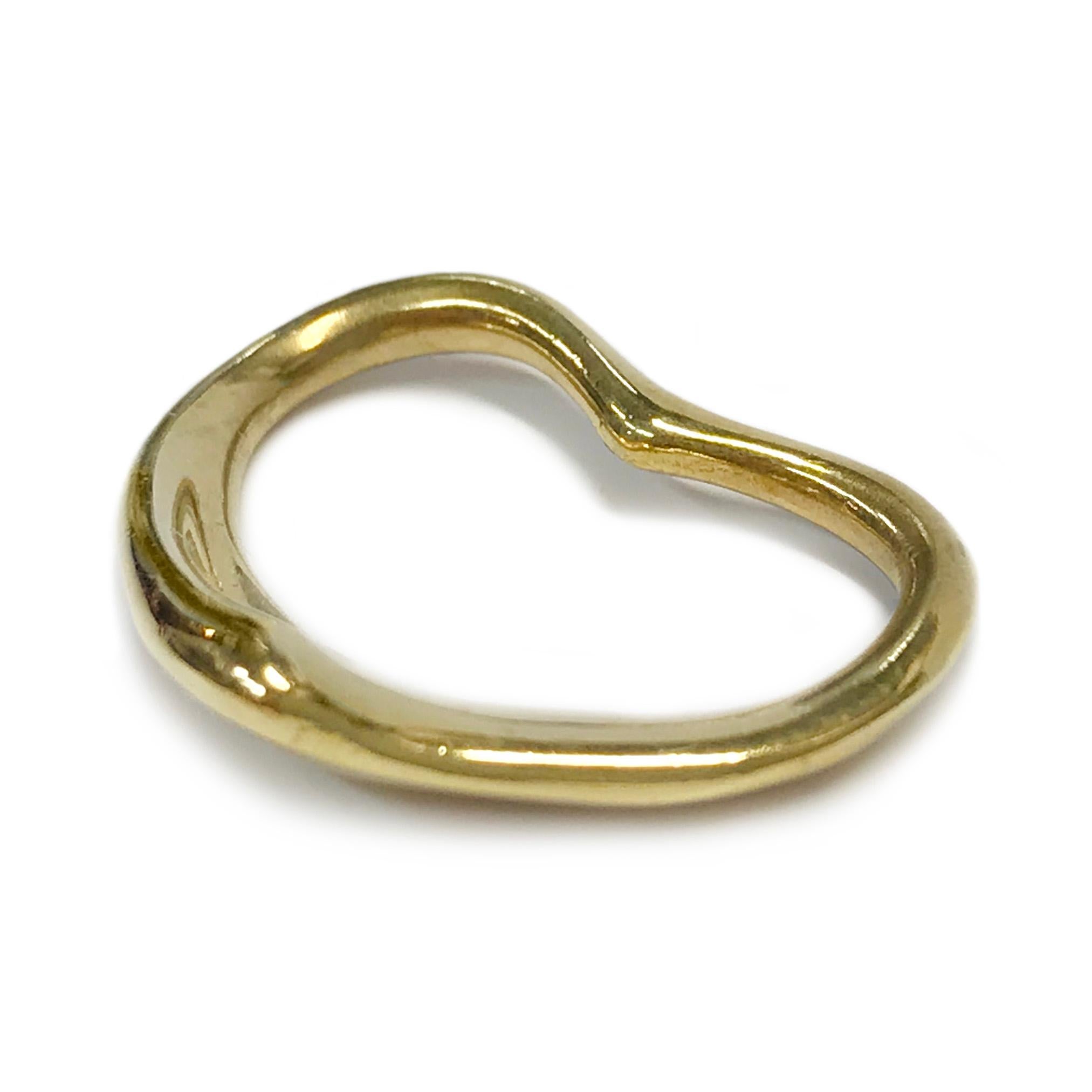 18 Karat Yellow Gold Open Heart Pendant. A simple yet elegant design that celebrates the spirit of love. Stamped on the back of the pendant is 18KT. The pendant measures 16mm in height and 20.5mm in width. The total weight of the pendant is 3.35