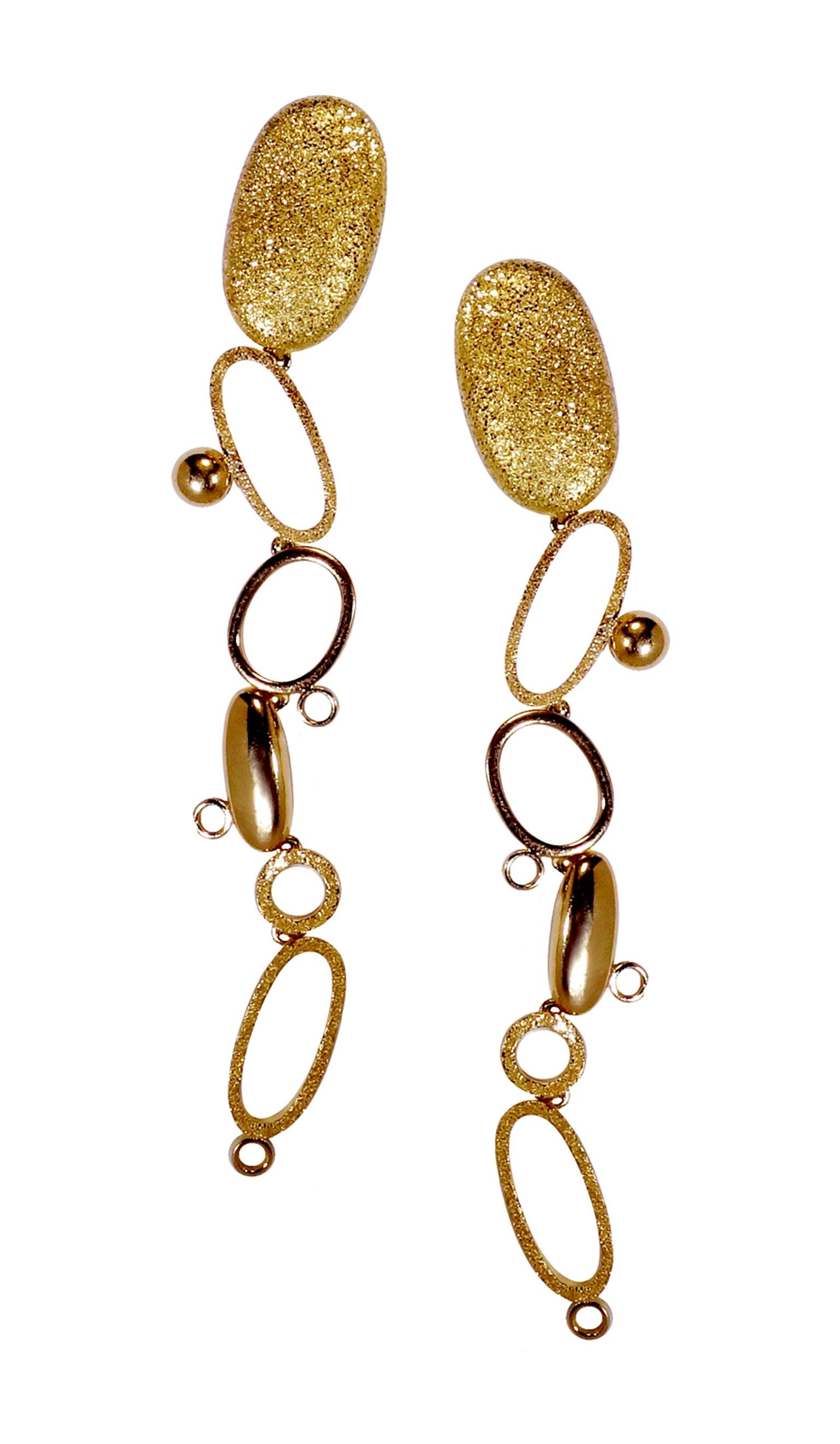 Elegant dangled 18 Karat Gold earrings composed of open and closed elements. Organically connected with an option of a detachable second layer creating a more dramatic look on your special occasions. 
Finished:  textured and polished. 

( Newly