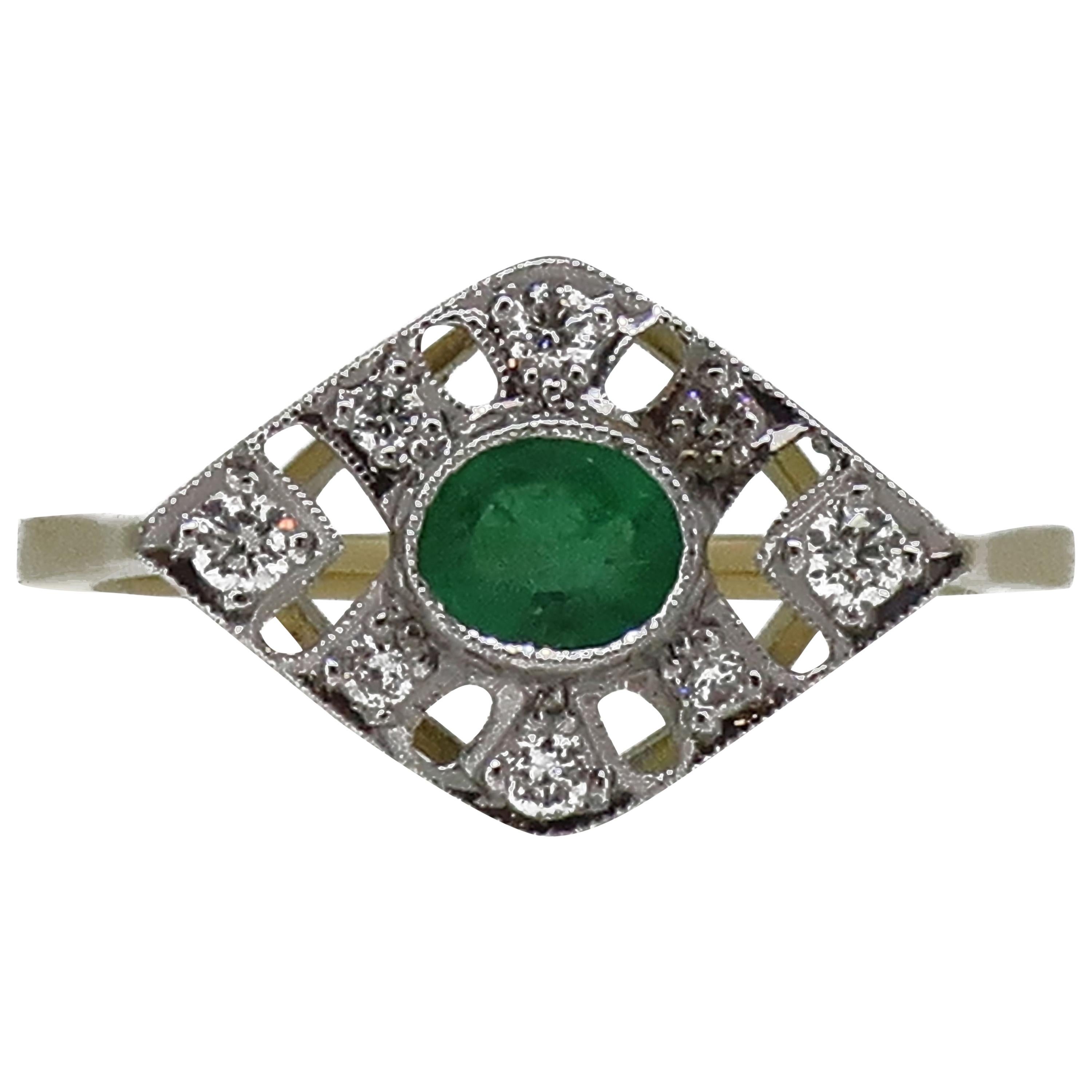 18 Karat Gold Oval Cut Emerald and Diamond Art Deco Style Cluster Ring