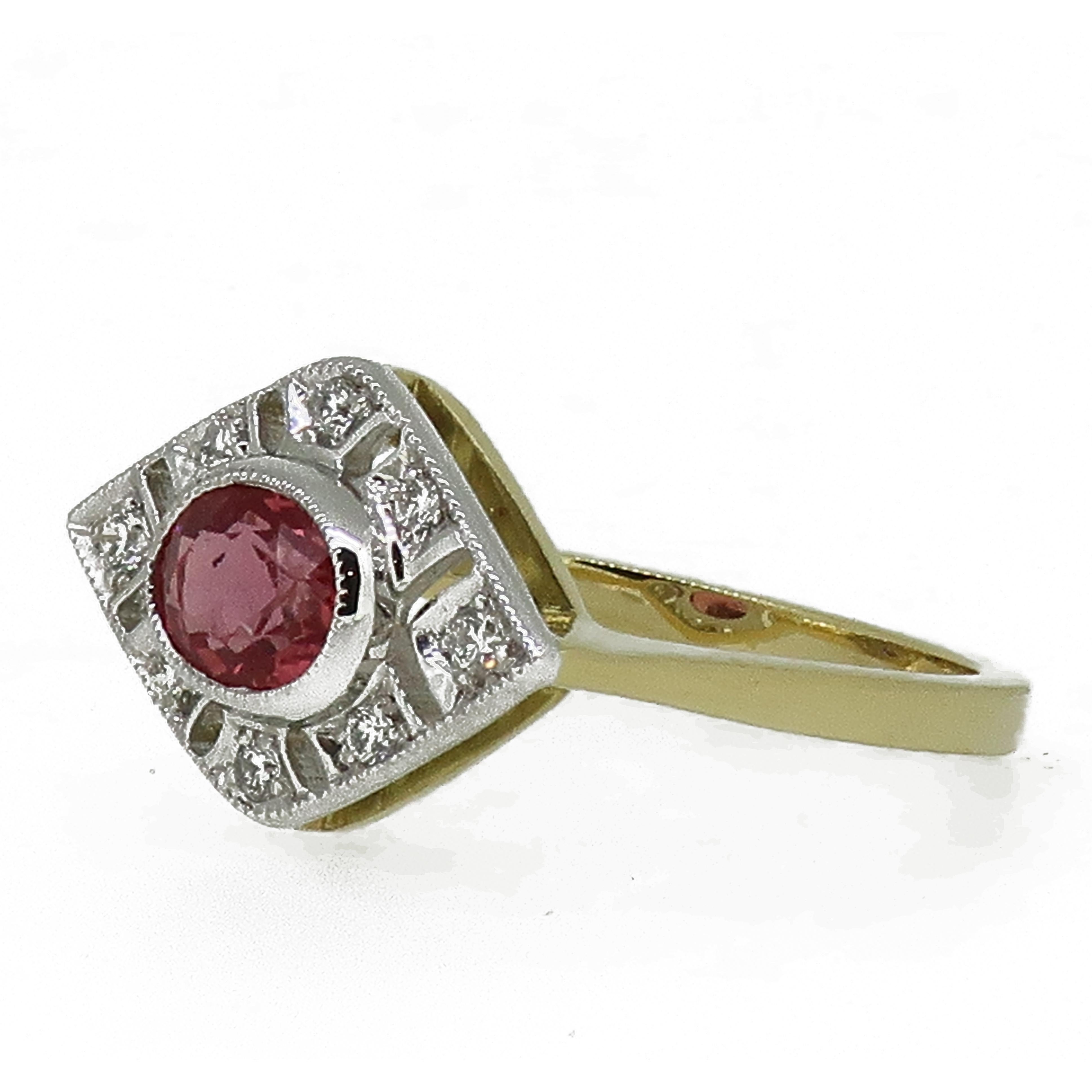 18 Karat Gold Oval Cut Pink Sapphire & Diamond Art Deco Style Cluster Ring.

A delicate and dainty oval cut pink orange sapphire set in a fine white gold bezel weighing 1.14ct, surrounded by a open frame work of white brilliant cut diamonds all set