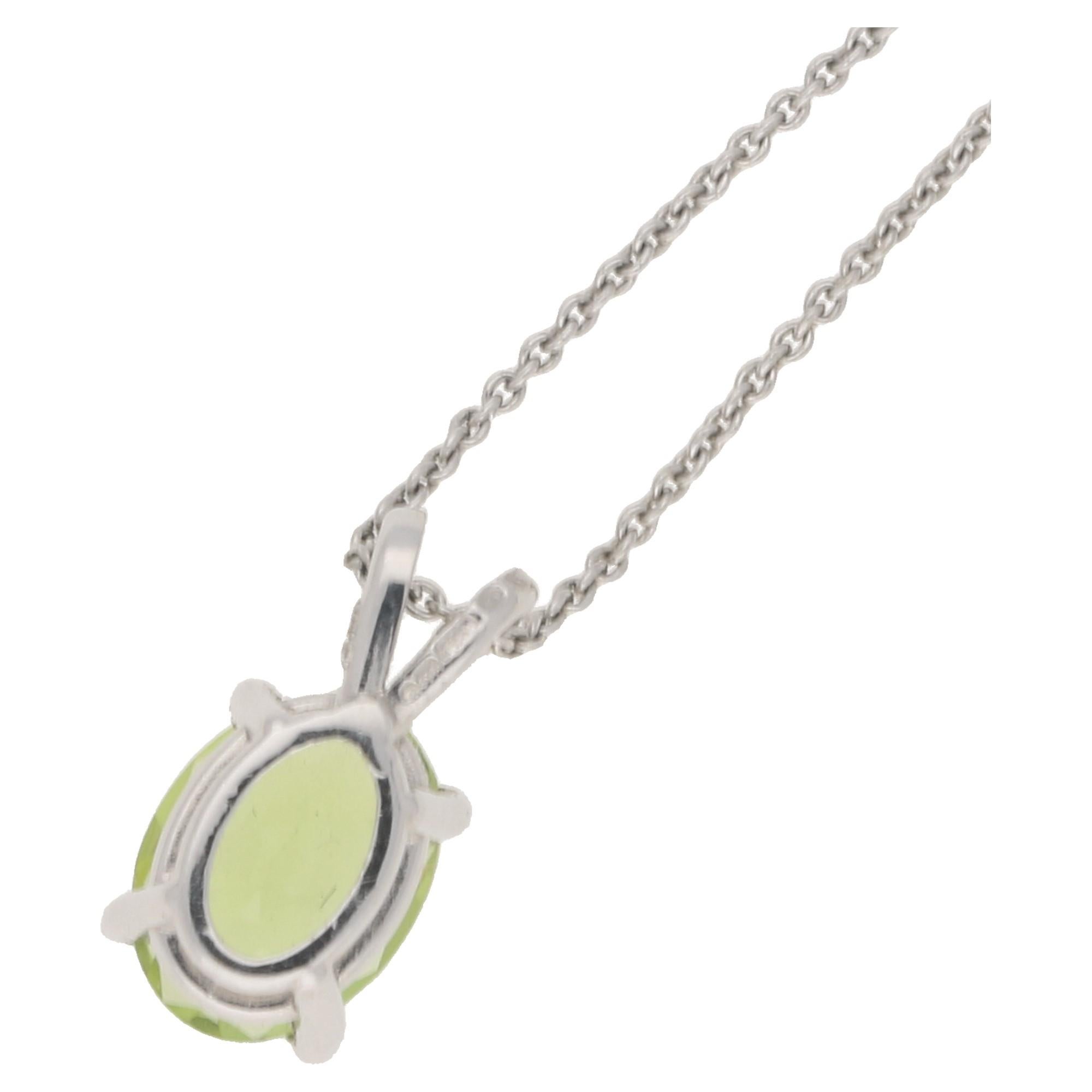 Oval Cut Oval Peridot Drop Pendant on Chain in 18 Karat White Gold  For Sale