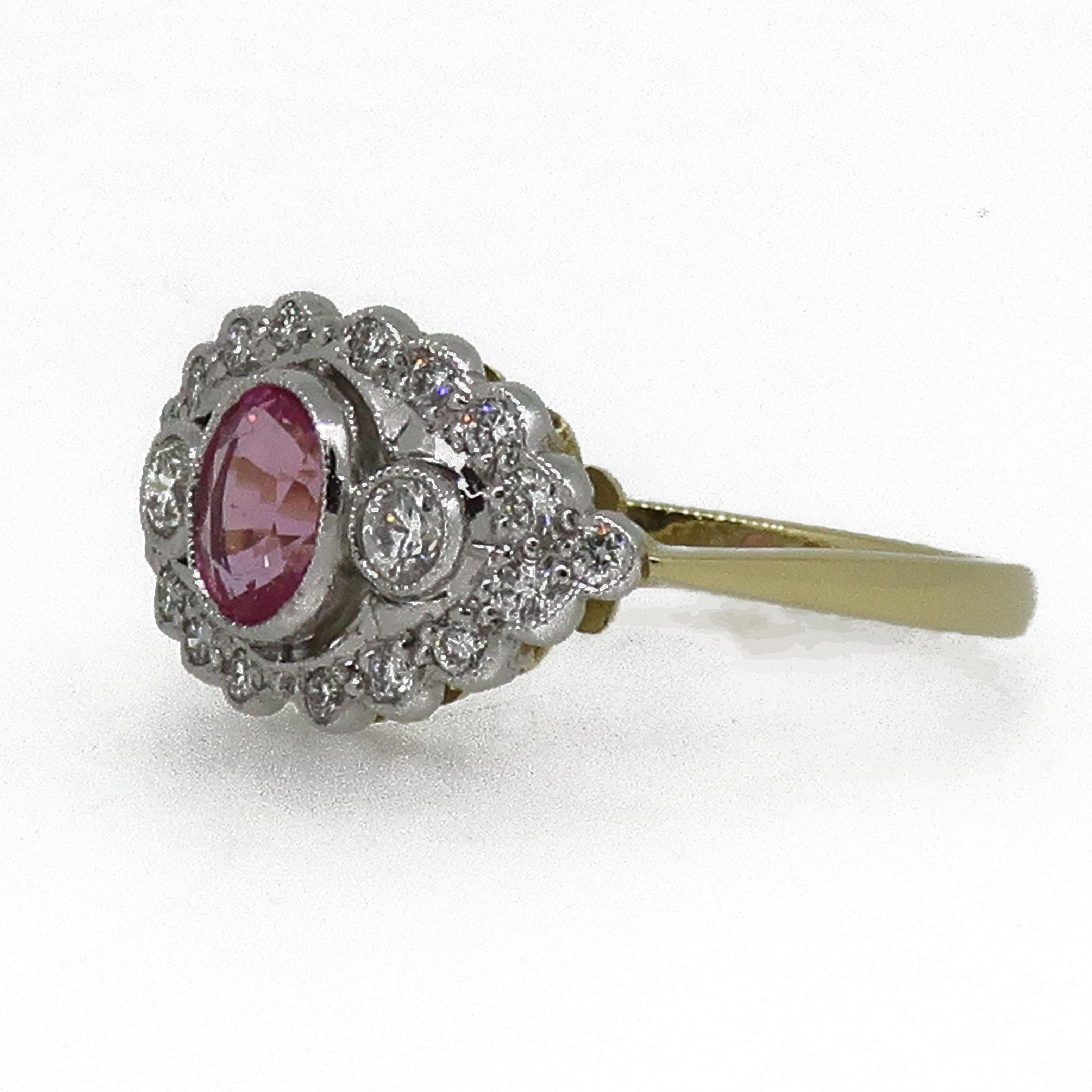 18 Karat Oval Pink Sapphire & Diamond Art Deco Style Cluster Ring

A dazzling oval pink sapphire and diamond ring that sits across the finger. Central oval cut Pink Sapphire & brilliant cut diamond three stone surrounded by a row of white brilliant