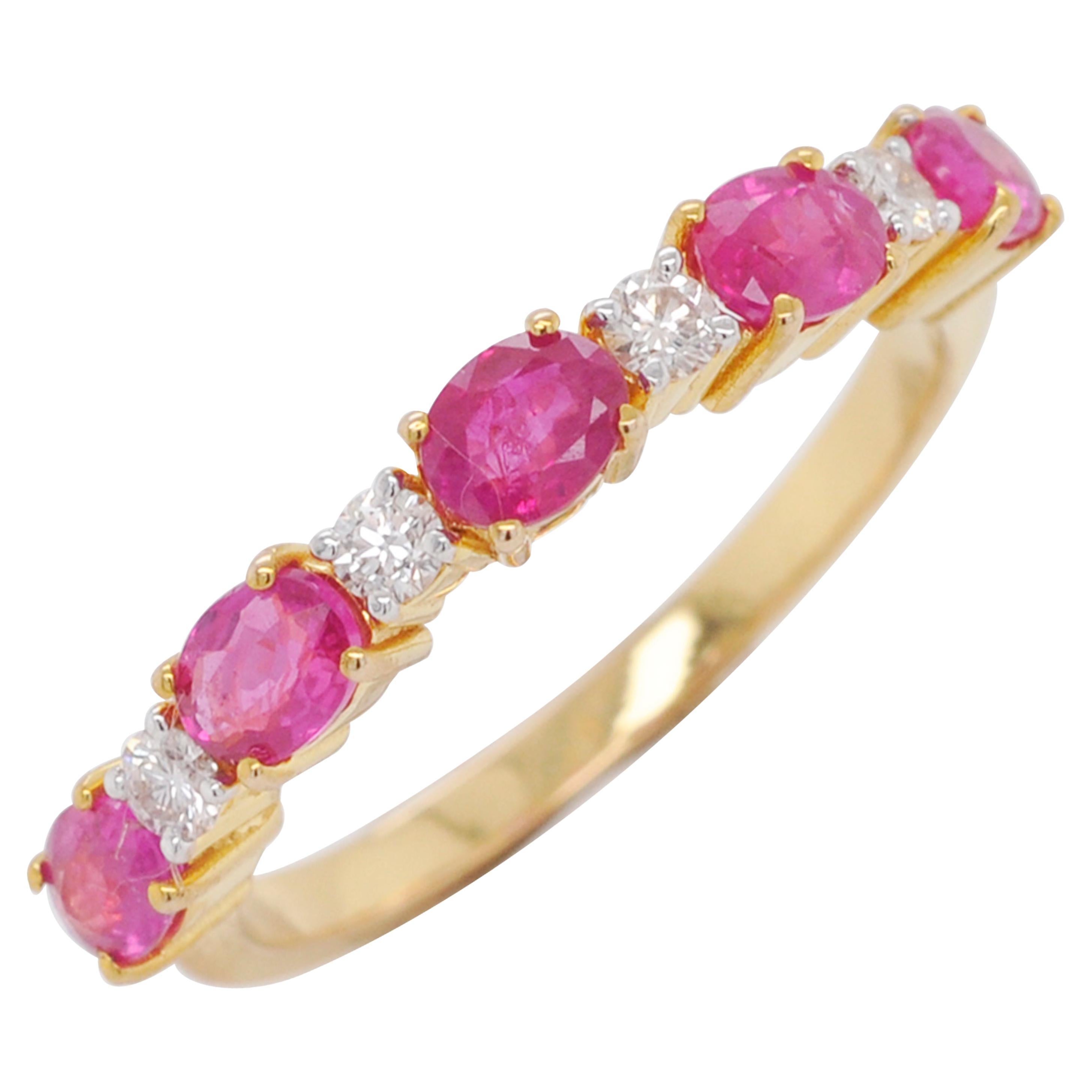 For Sale:  18 Karat Gold Oval Ruby Diamond Linear Band Ring