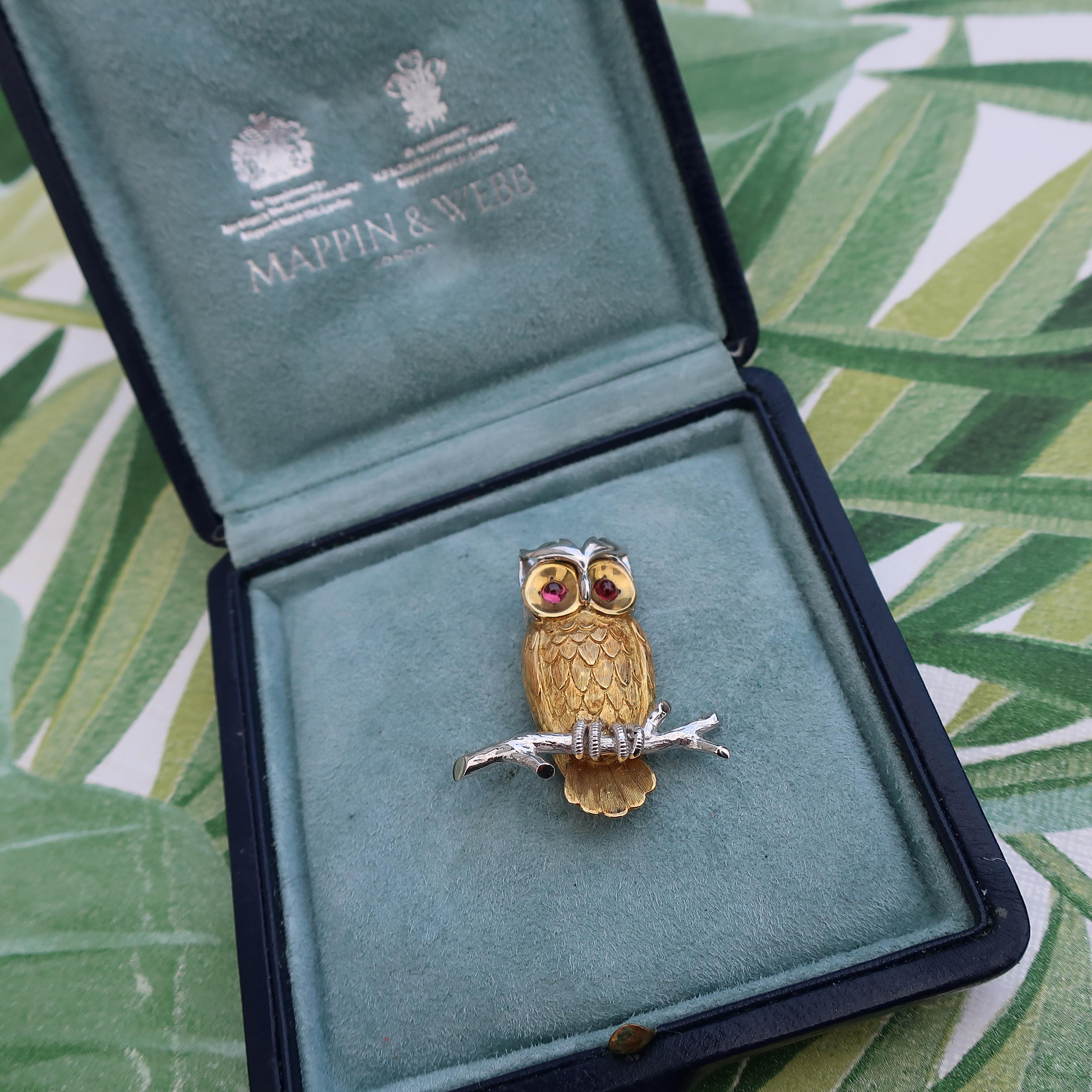 18 Karat Gold Owl Brooch with Ruby Eyes

A unique 18ct yellow and white gold owl brooch. This gorgeous little fella has cabochon ruby eyes. His body is 18ct solid yellow gold, and his head and the branch are 18ct solid white gold
This owl comes in a