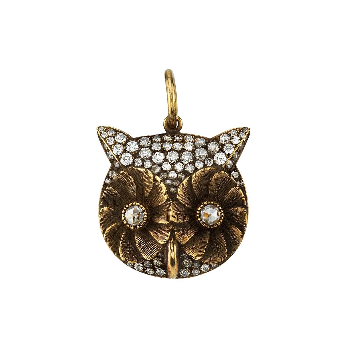 Approximately 0.70ctw G-H/VS  old European cut diamonds and 0.10ctw rose cut diamonds pavè set set in a handcrafted oxidized 18K yellow gold owl charm. 

Available in a polished or oxidized finish.

Price does not include chain.