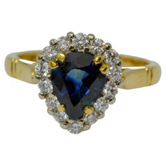 18 Karat Gold Pear Shape Sapphire and Diamond Basket Back Cluster Ring