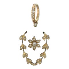 Pendentif croix en or 18 carats et onyx