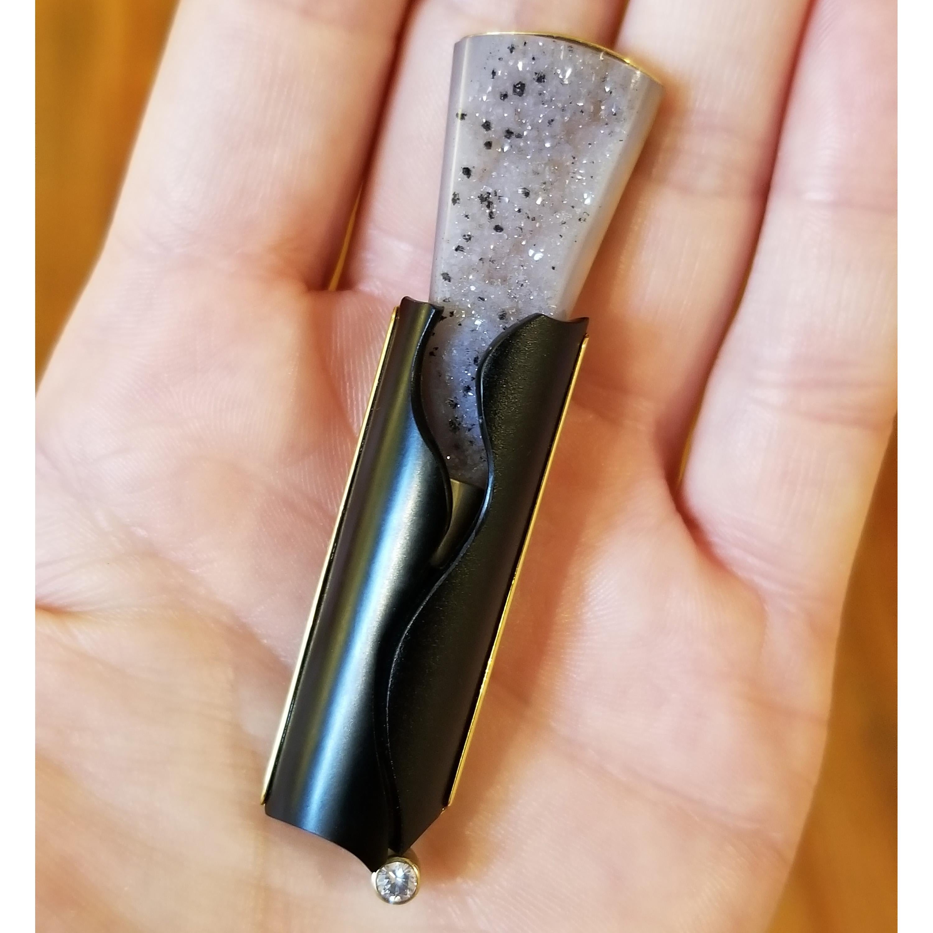 This elegant torch is a stunning combination of exquisitely carved and polished natural black chalcedony with natural and raw amethystine silica drusy. This piece is a study in textural contrasts.

Steve Walters, the renowned lapidary artist, carved