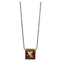 18 Karat Gold Pendant with White Diamond in White Platinum Chain