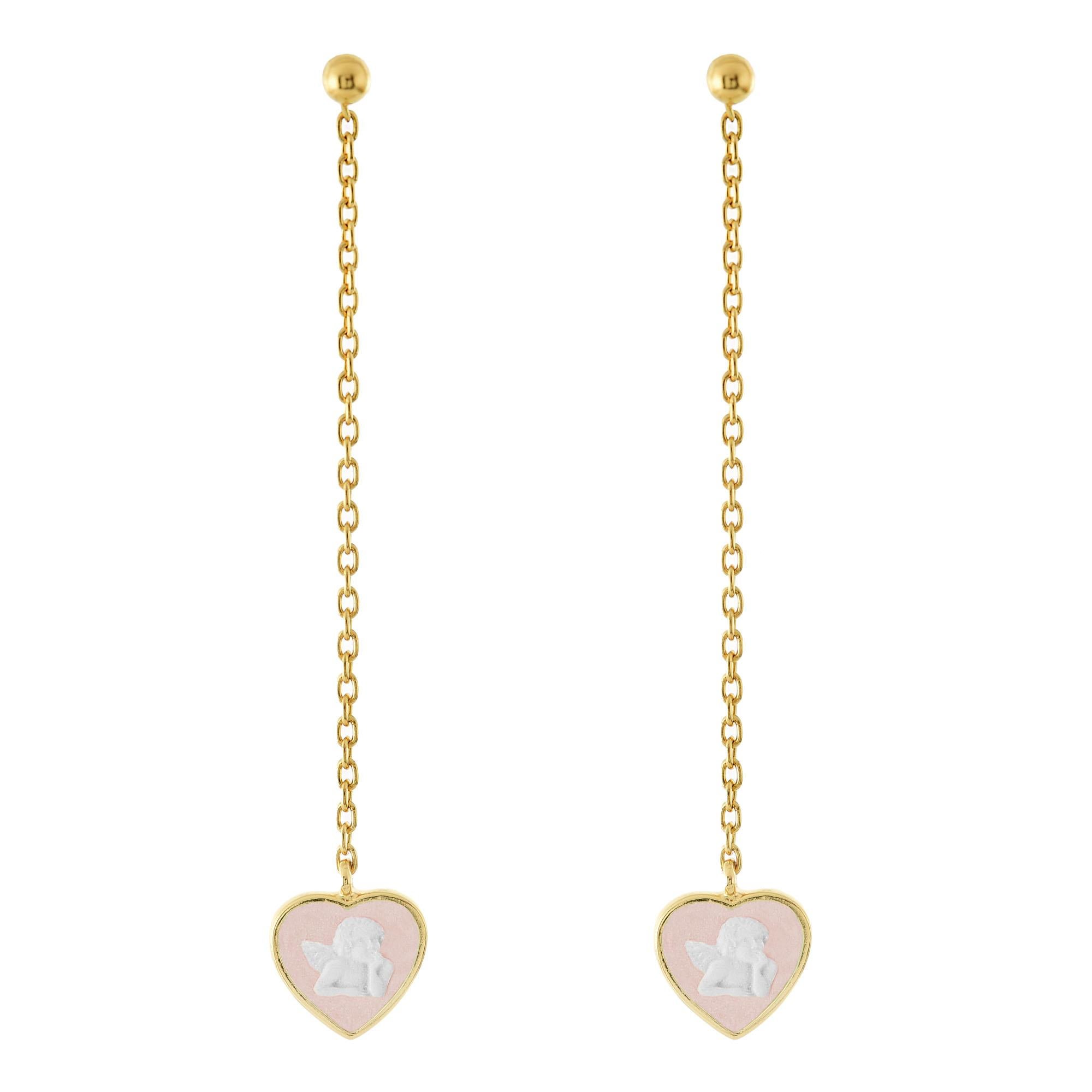 Beautifully hand crafted porcelain cameo earrings mounted in 18k gold plated sterling silver. With a delicate look these chain earrings depict little cherubs, one of the most classic subject of cameo making. Available in pink, turquoise, lilla,