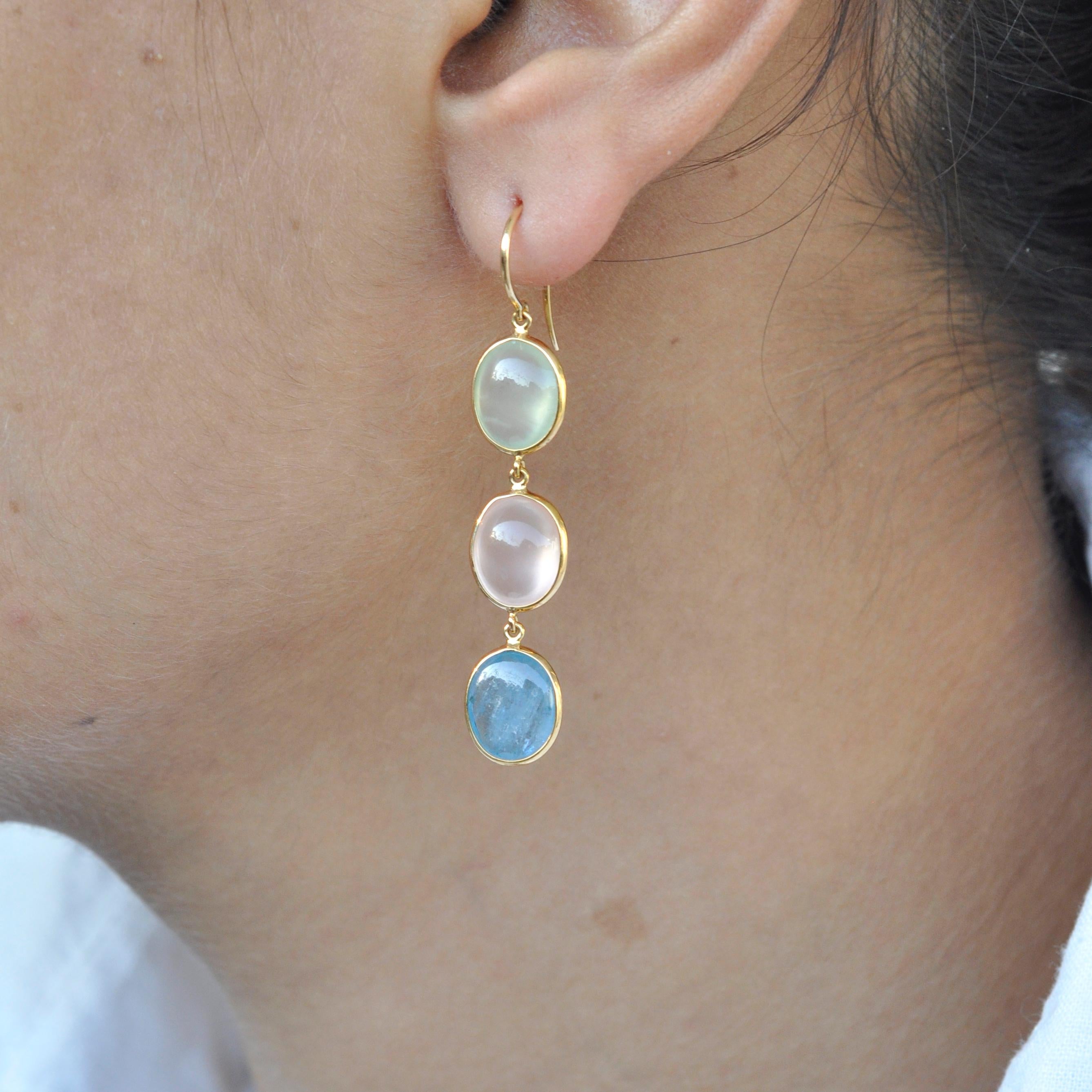 These stunning prehnite, rose quartz, aquamarine 18k yellow gold dangle earrings provide a look that is both trendy and classic. These earrings are a great staple to add to your collection, and can be worn with both casual and formal wear. These