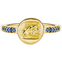 18 Karat Gold Ram Sapphire Ring