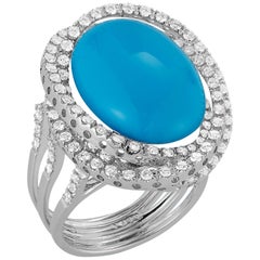 18 Karat Gold Ring with 12.54 Carat Aquamarine Cabachon Stone and 117 Diamonds