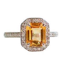 18 Karat Gold Ring with 1.72 Carat Emerald Cut Citrine and 0.32 Carat of Diamond