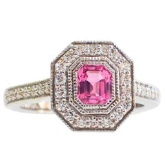 18 Karat Gold Ring with a 0.60 Carat Pink Sapphire and 0.35 Carat of Diamond