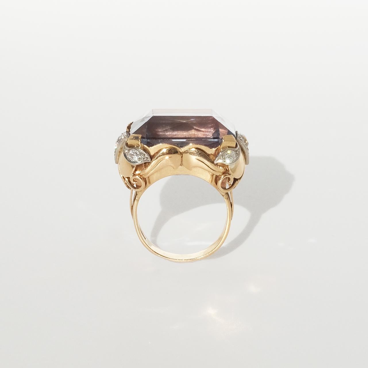 18 karat gold ring with a large synthetic spinel and diamonds. 2