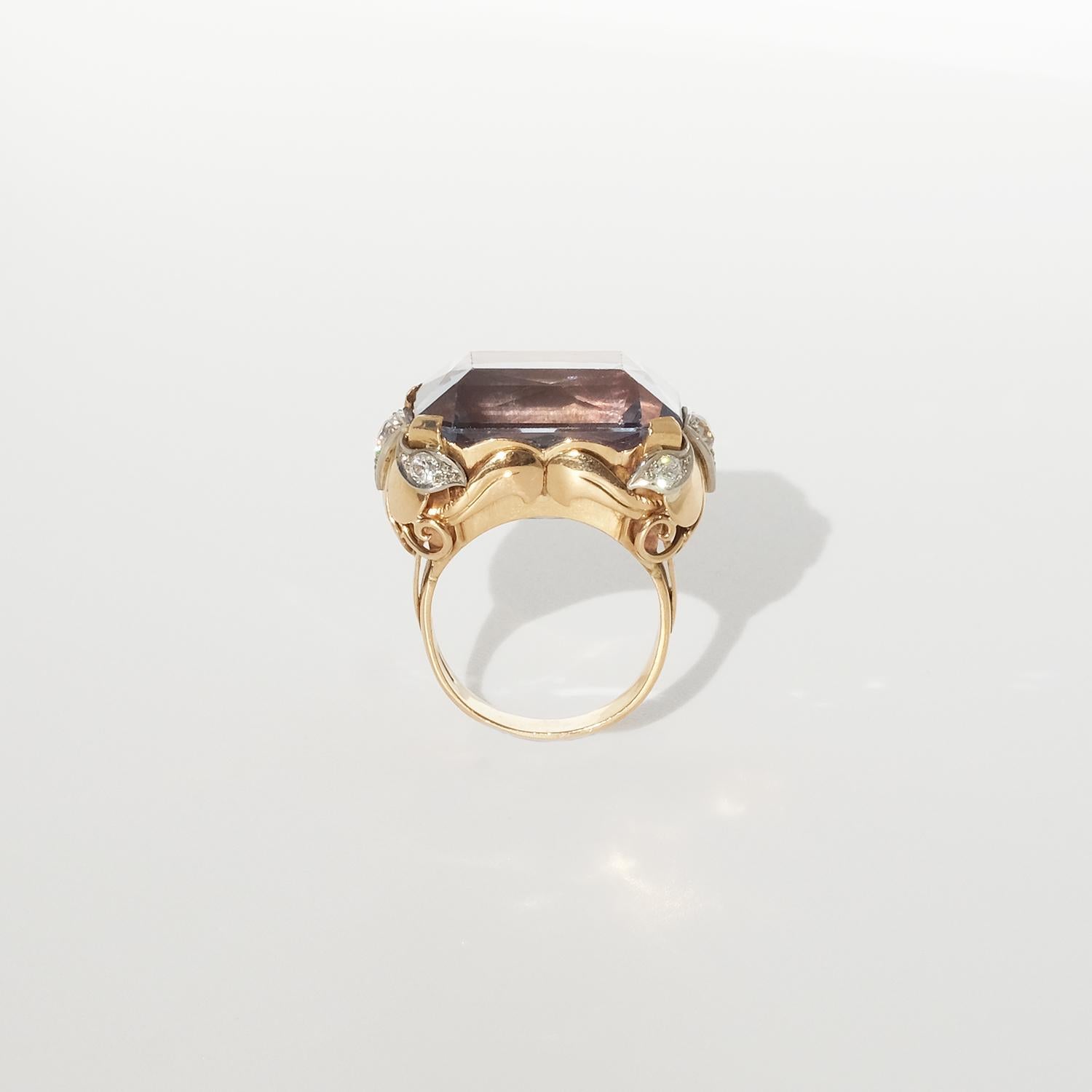 18 karat gold ring with a large synthetic spinel and diamonds. 3