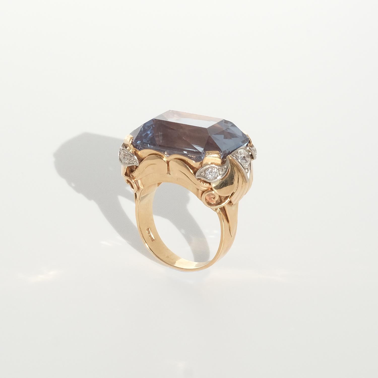 Women's or Men's 18 karat gold ring with a large synthetic spinel and diamonds.